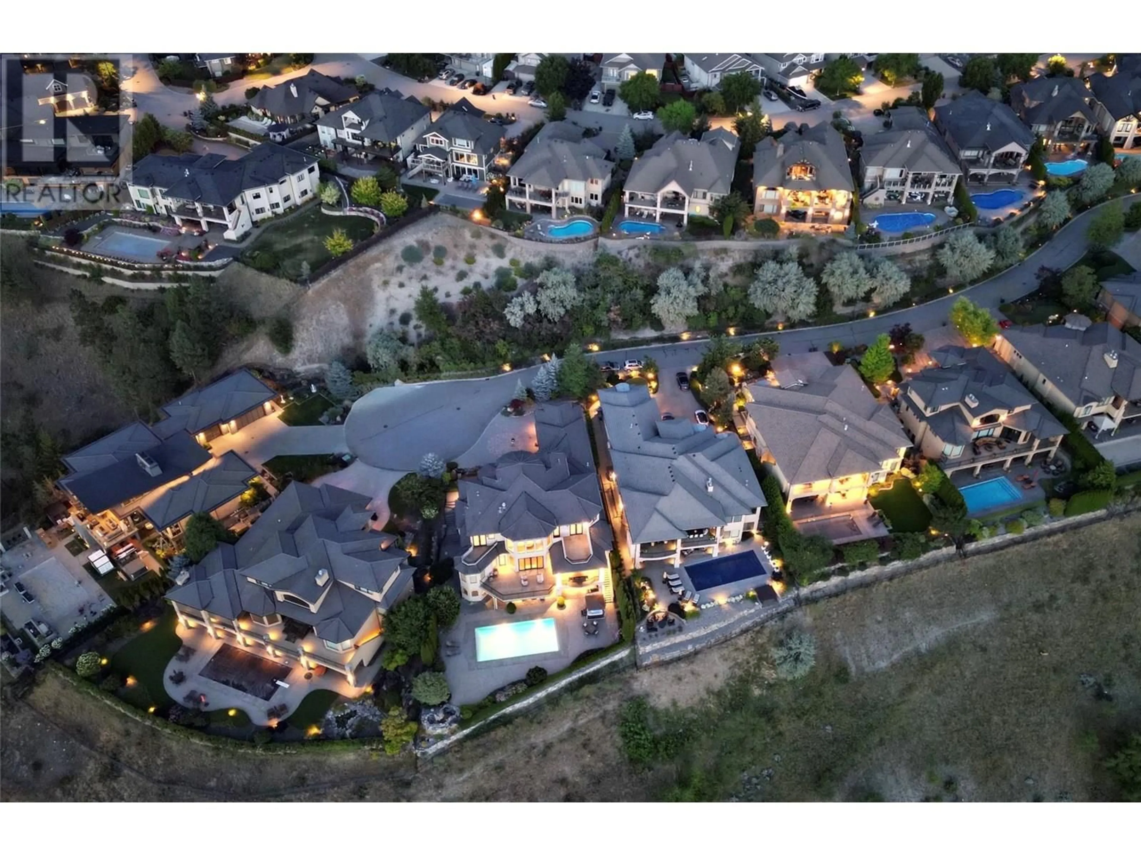 A pic from outside/outdoor area/front of a property/back of a property/a pic from drone, mountain view for 4860 TUSCANY LANE, Kelowna British Columbia V1W5H3