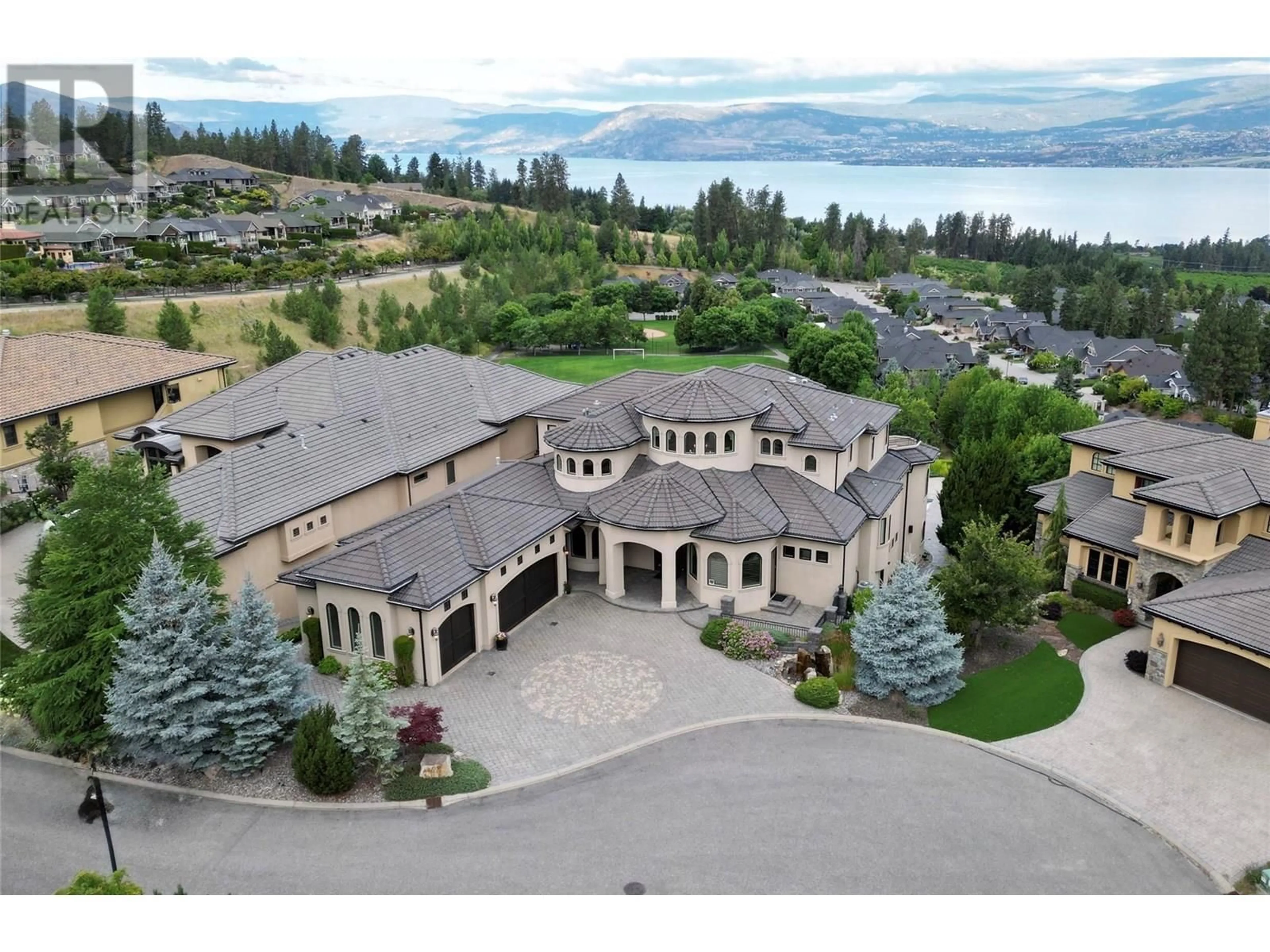 A pic from outside/outdoor area/front of a property/back of a property/a pic from drone, mountain view for 4860 TUSCANY LANE, Kelowna British Columbia V1W5H3