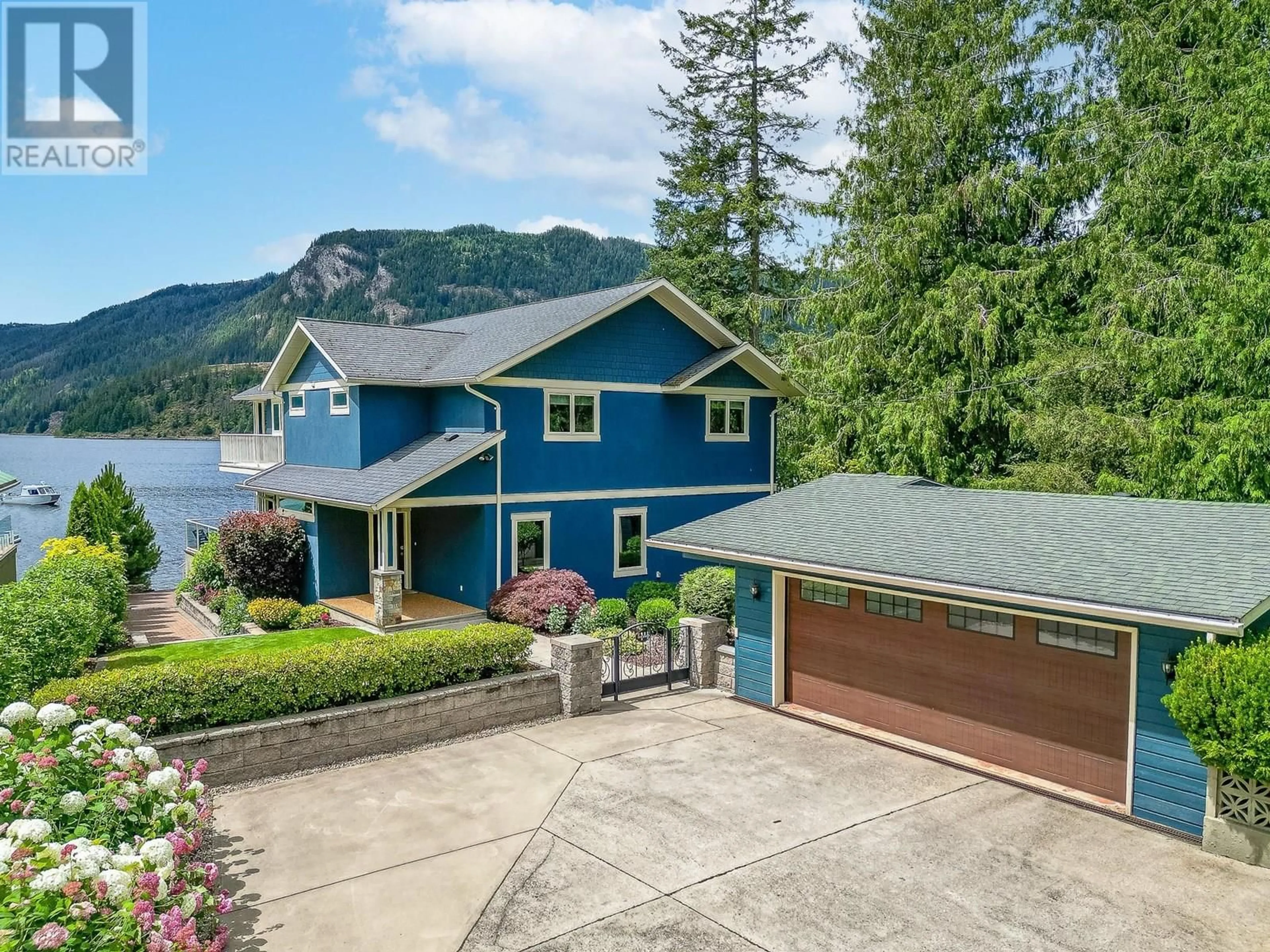 A pic from outside/outdoor area/front of a property/back of a property/a pic from drone, water/lake/river/ocean view for 44 MONTCALM CRESCENT, Sicamous British Columbia V0E2V1