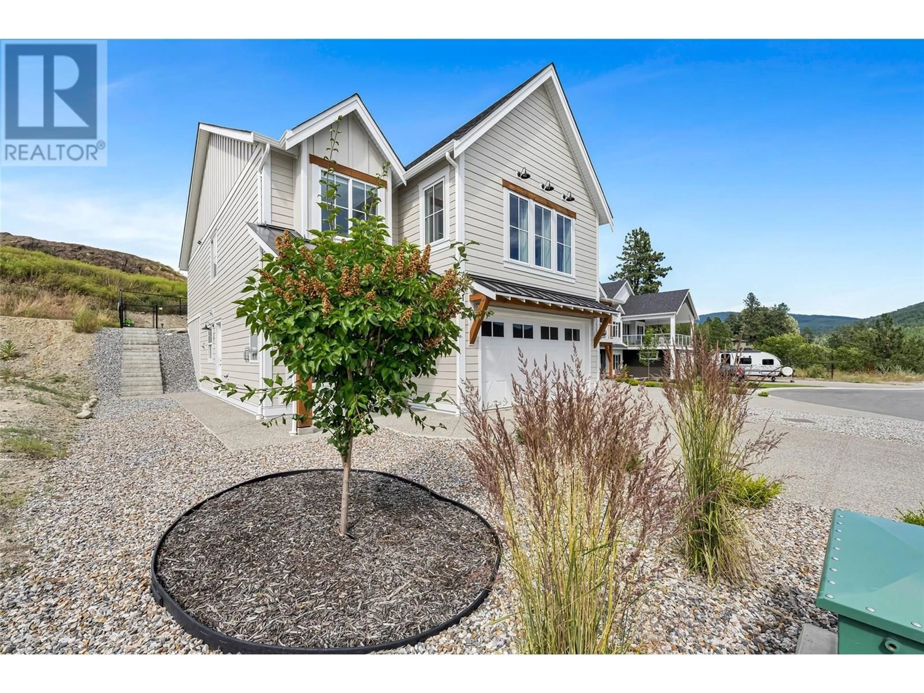 Home with vinyl exterior material, street for 109 WHITEFISH ROAD, Vernon British Columbia V1B3M5