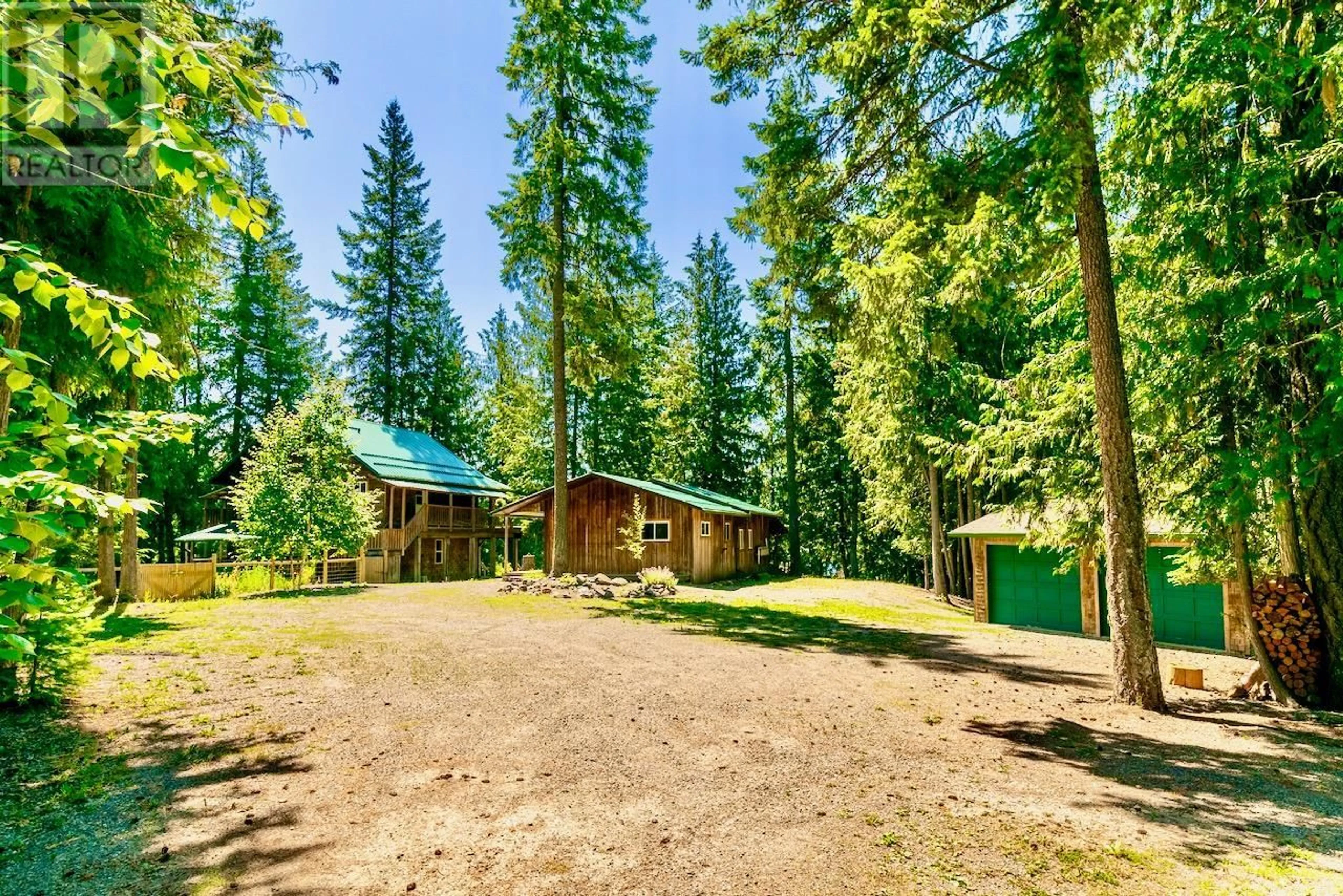 A pic from outside/outdoor area/front of a property/back of a property/a pic from drone, forest/trees view for 5244 MEADOW CREEK ROAD, Celista British Columbia V0E1M6