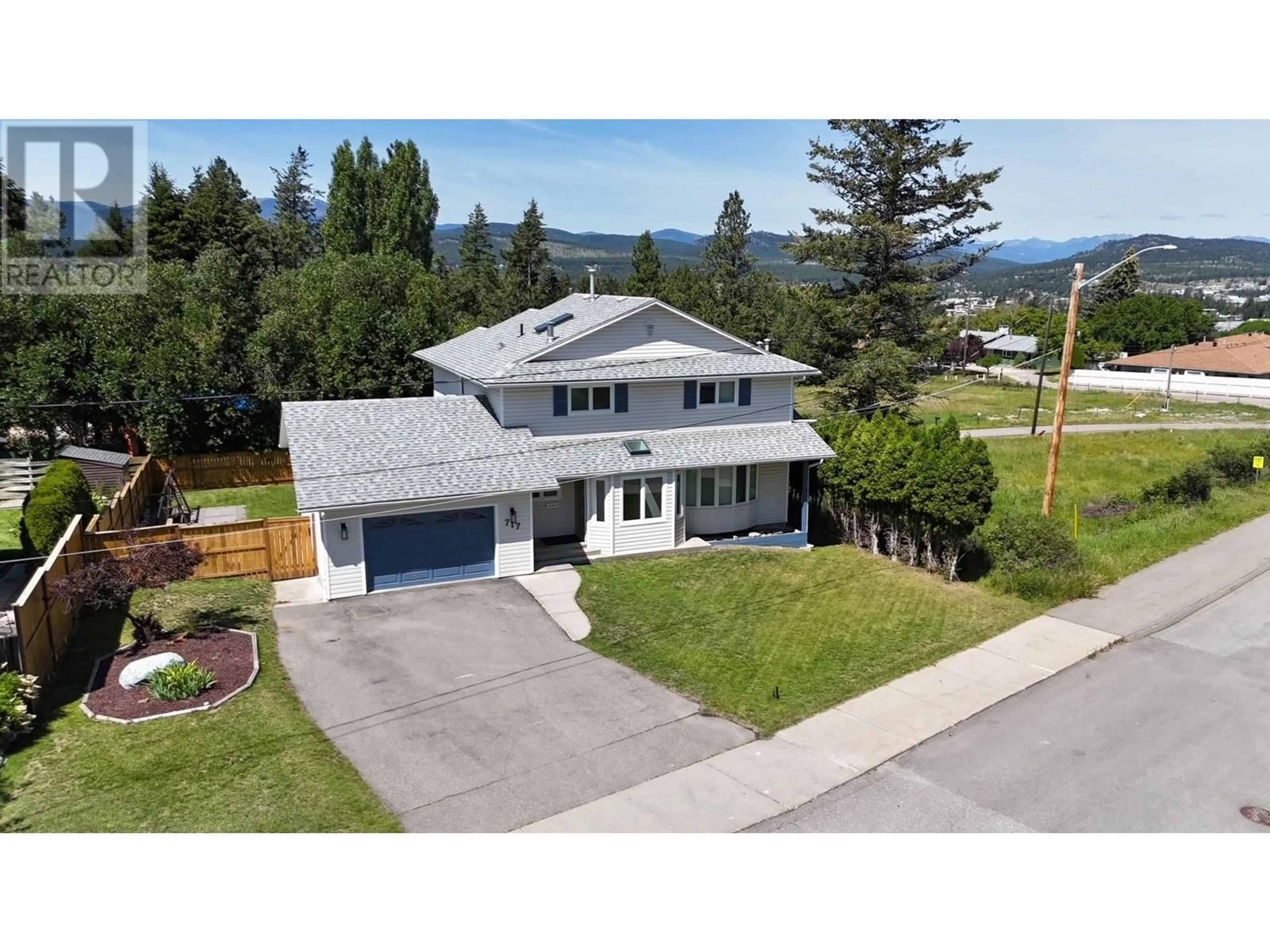 A pic from outside/outdoor area/front of a property/back of a property/a pic from drone, mountain view for 717 27TH AVENUE SOUTH, Cranbrook British Columbia V1C3J6