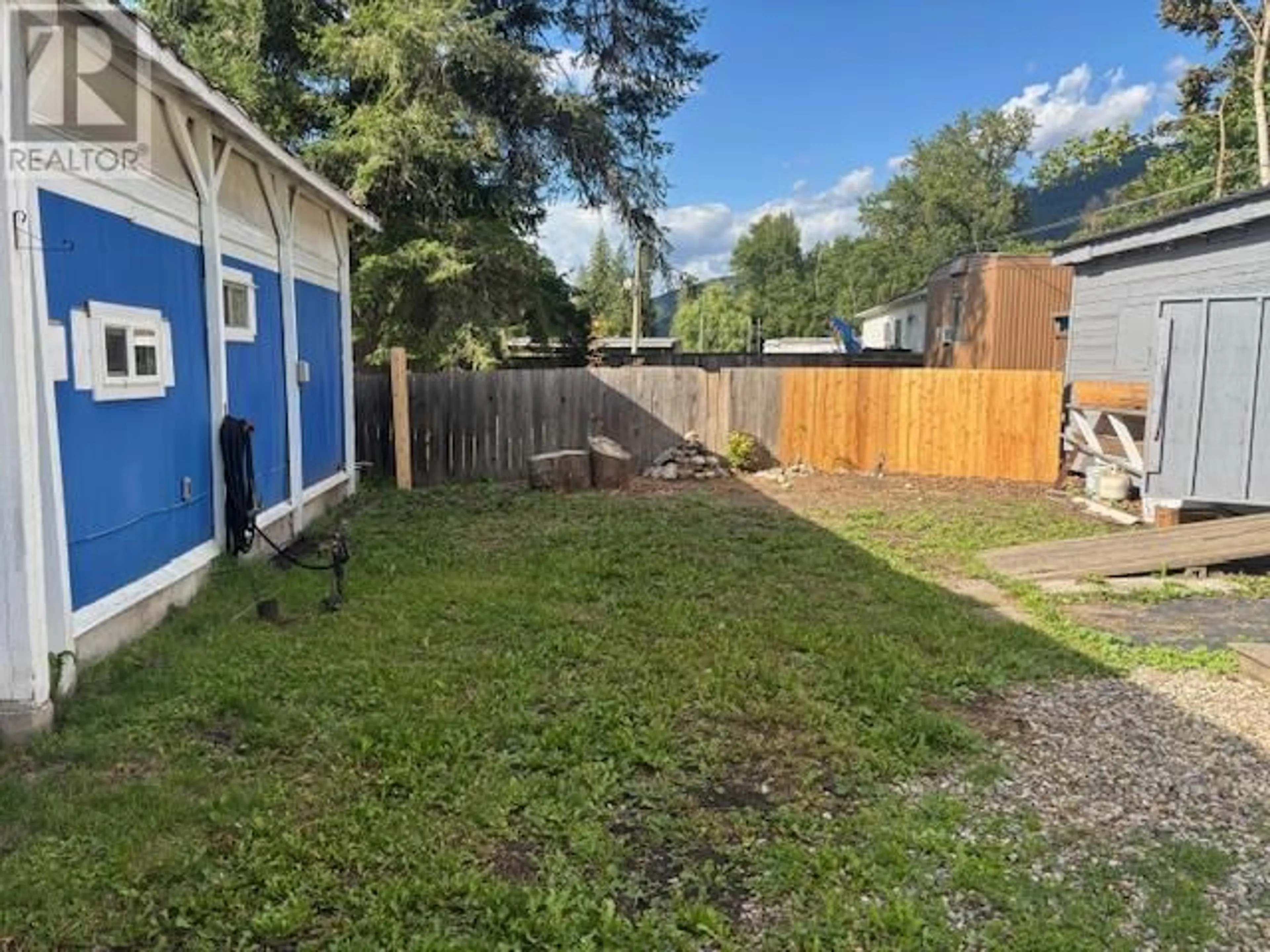 A pic from outside/outdoor area/front of a property/back of a property/a pic from drone, street for 1 ROBSON ROAD, Mara British Columbia V0E2K0