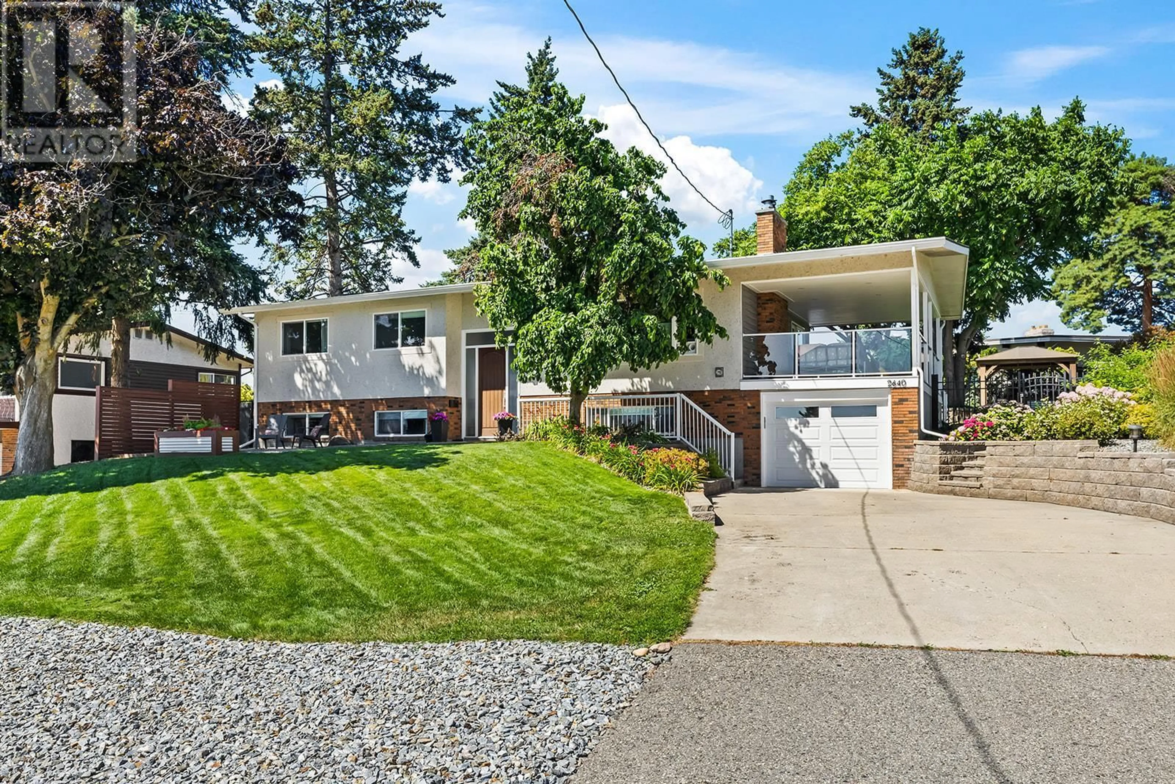 Home with vinyl exterior material, street for 2640 THACKER DRIVE, West Kelowna British Columbia V1Z1W3