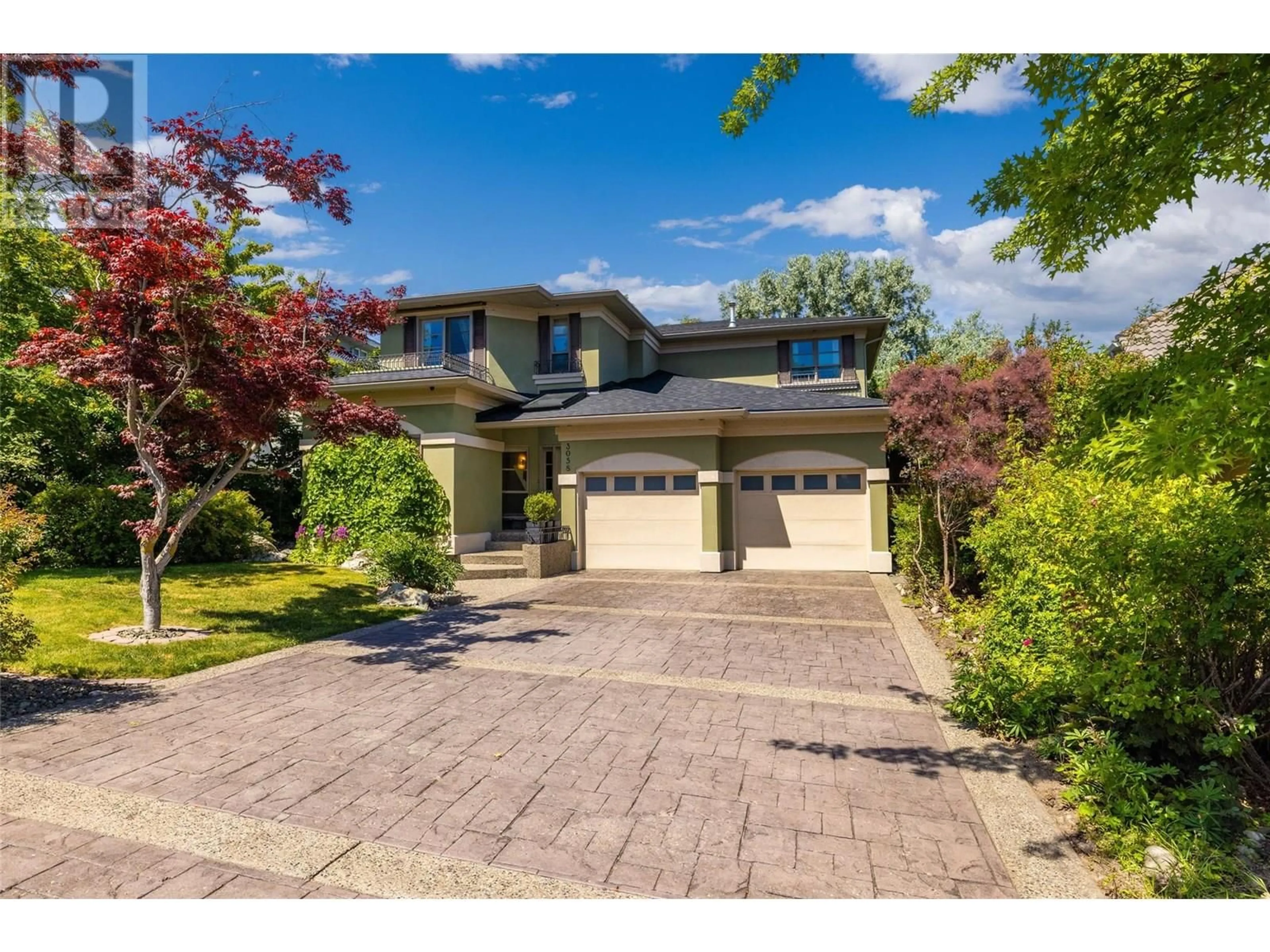 A pic from outside/outdoor area/front of a property/back of a property/a pic from drone, street for 3058 QUAIL RUN DRIVE, Kelowna British Columbia V1V1Z7