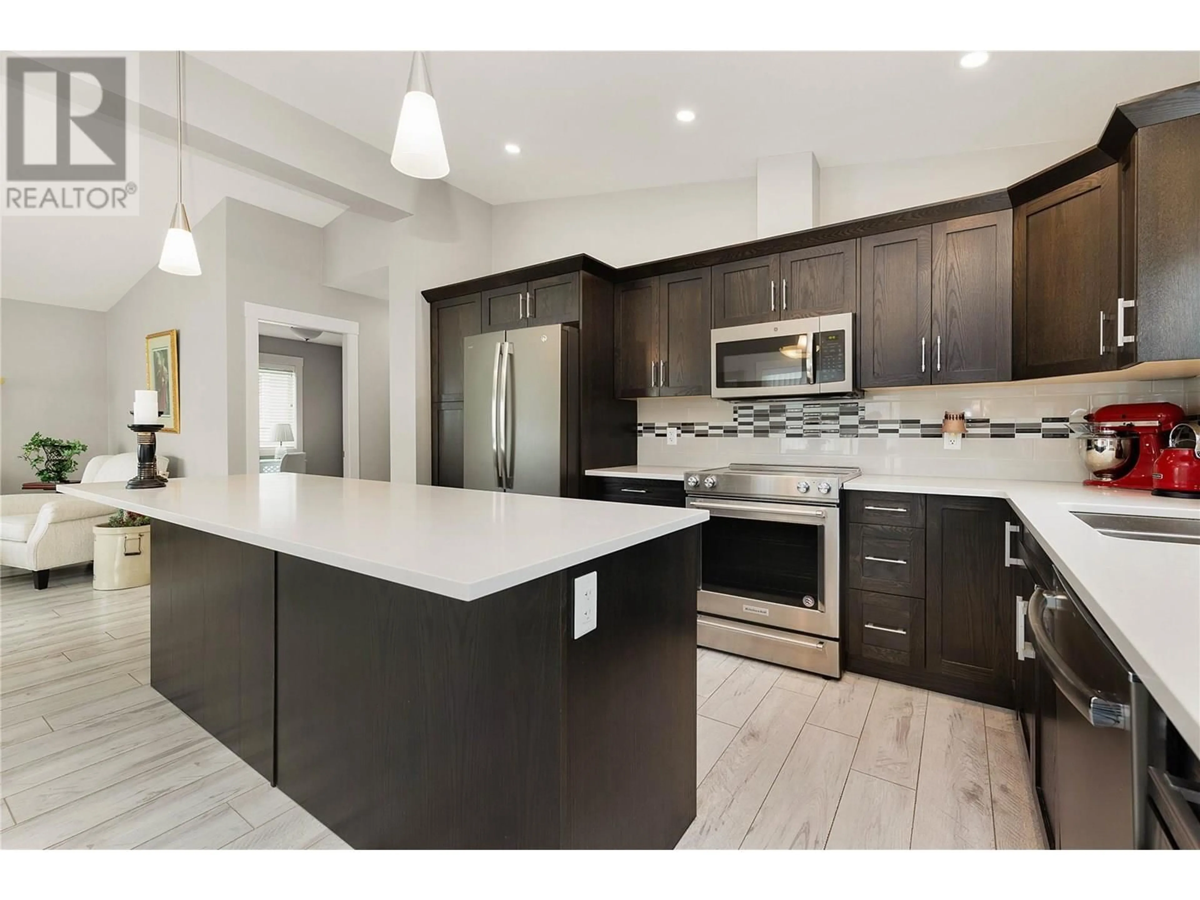 Open concept kitchen, ceramic/tile floor for 74 - 2100 55 AVENUE, Vernon British Columbia V1T9Y6