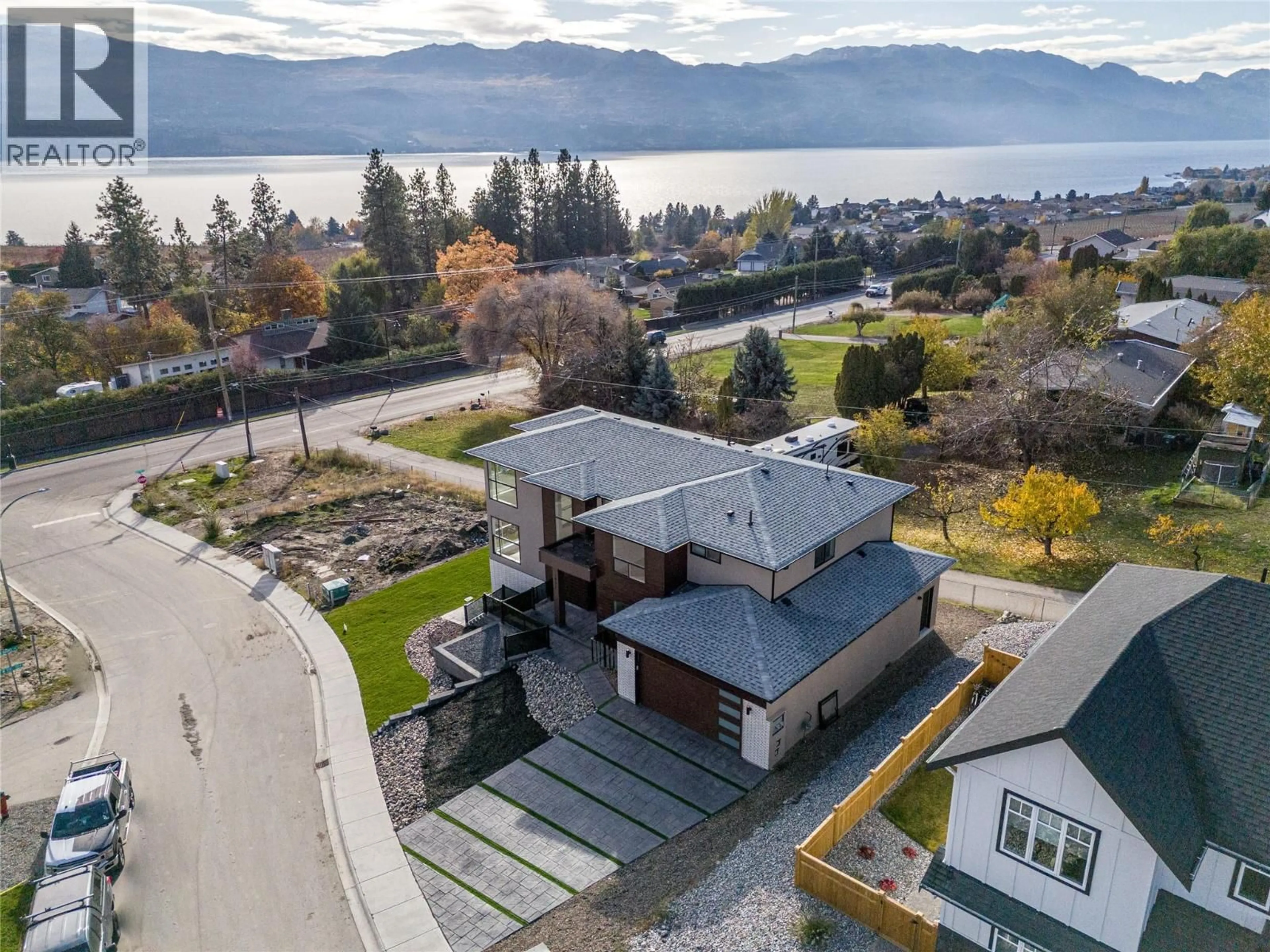 A pic from outside/outdoor area/front of a property/back of a property/a pic from drone, water/lake/river/ocean view for 1047 OAK BARREL PLACE, West Kelowna British Columbia V1Z2G9