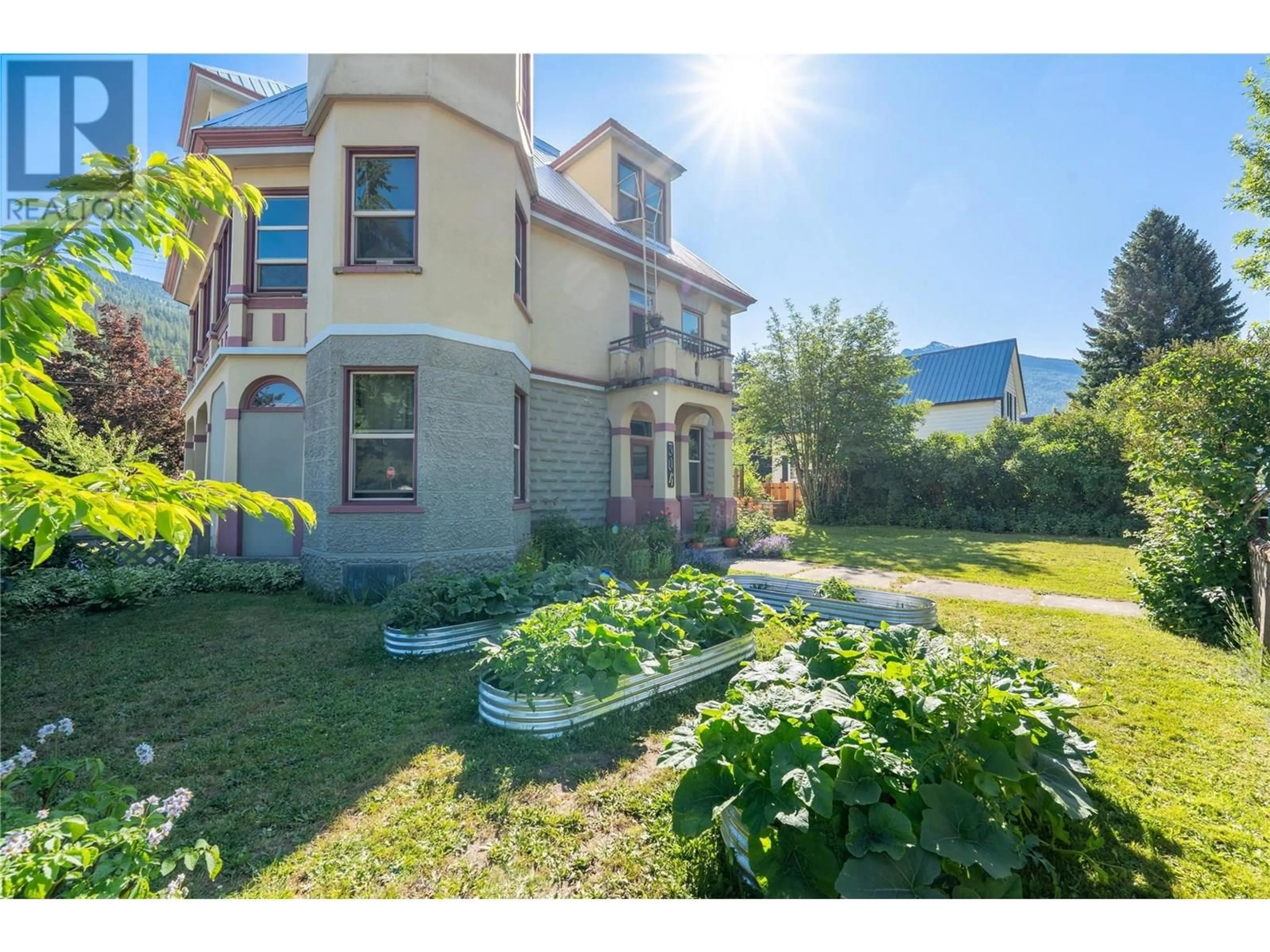 A pic from outside/outdoor area/front of a property/back of a property/a pic from drone, street for 304 SECOND STREET EAST, Revelstoke British Columbia V0E2S0