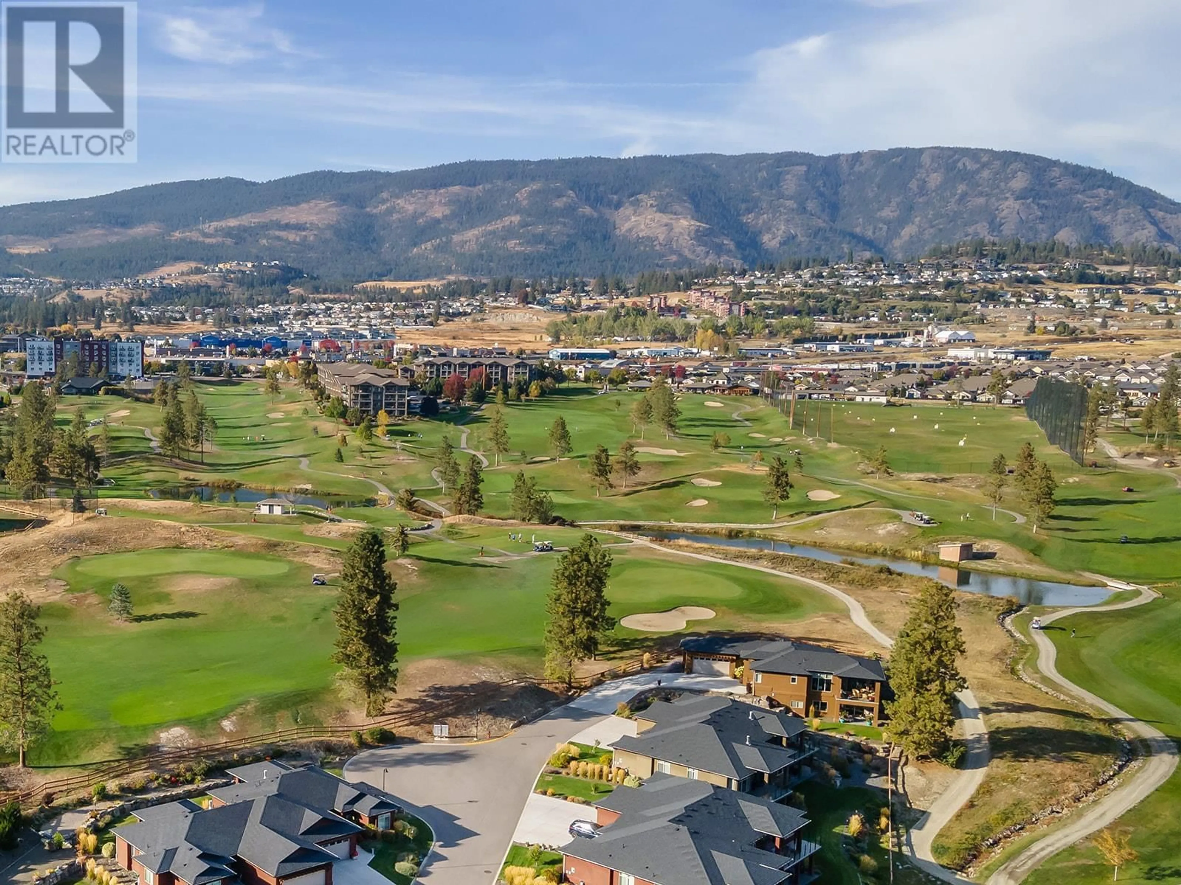 A pic from outside/outdoor area/front of a property/back of a property/a pic from drone, mountain view for 102 - 3533 CARRINGTON ROAD, West Kelowna British Columbia V4T2Z9