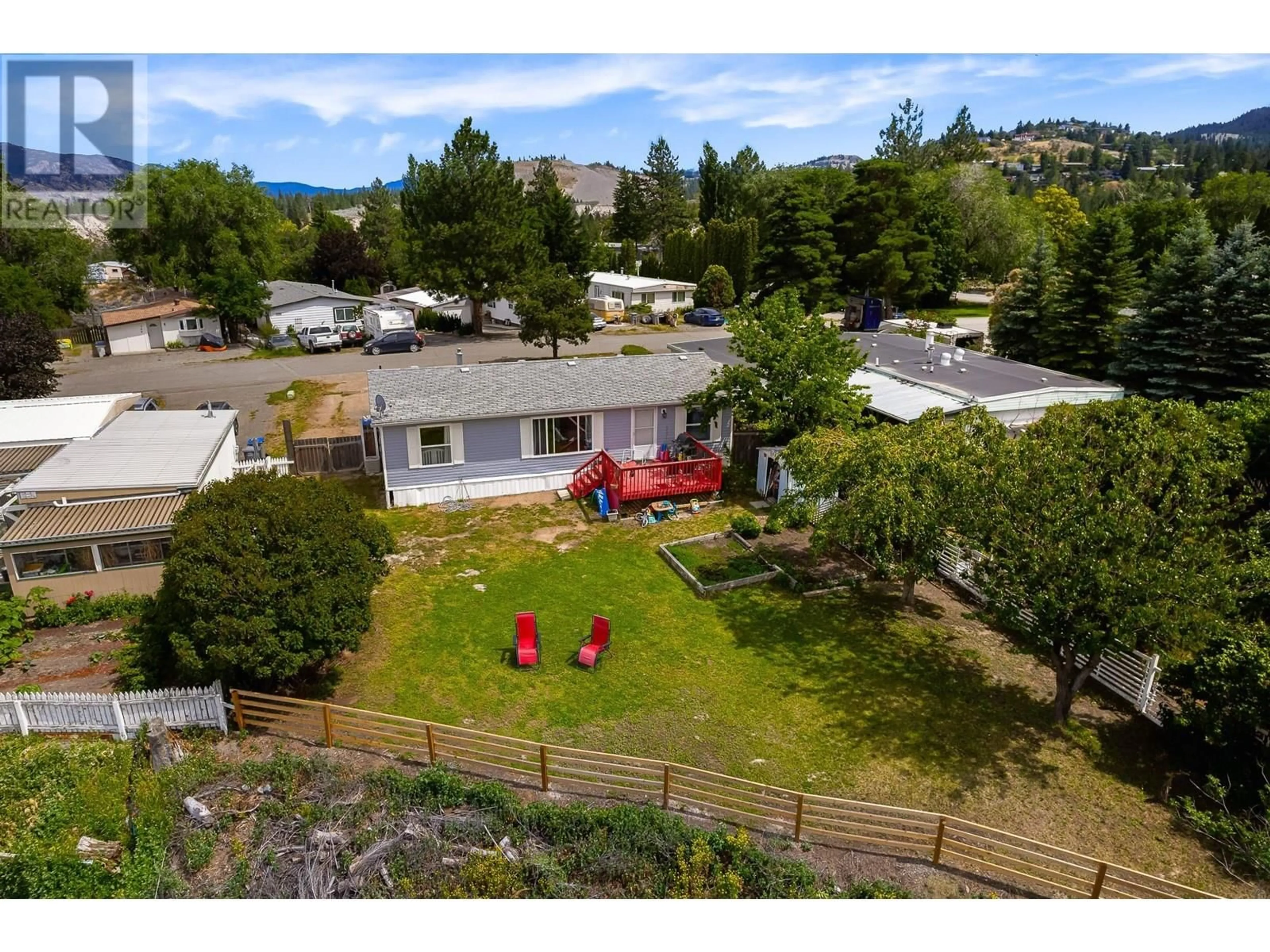 A pic from outside/outdoor area/front of a property/back of a property/a pic from drone, mountain view for 779 KLAHANIE DRIVE, Kamloops British Columbia V2C5R1