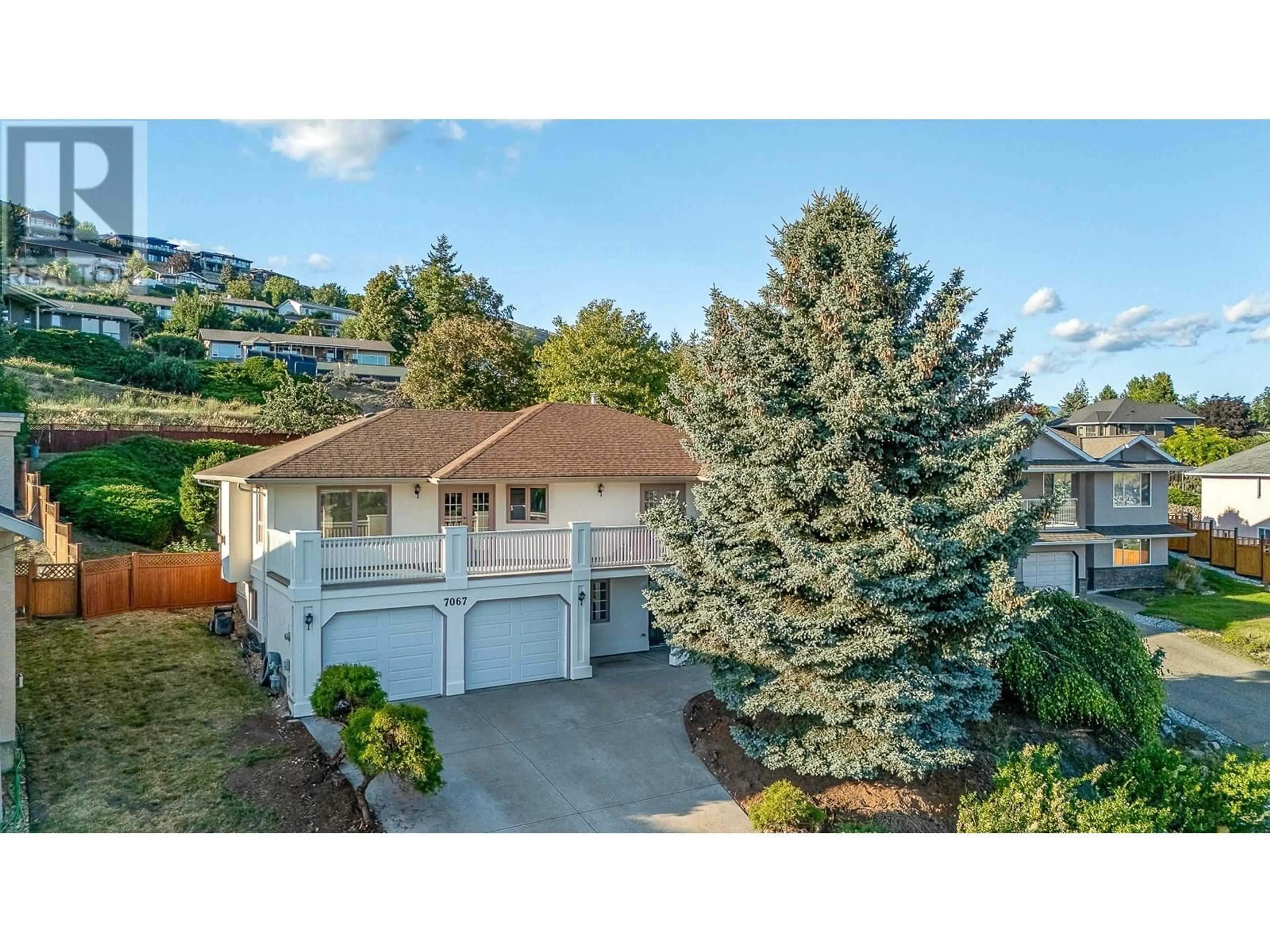 A pic from outside/outdoor area/front of a property/back of a property/a pic from drone, mountain view for 7067 AMBER DRIVE, Vernon British Columbia V1H1P4
