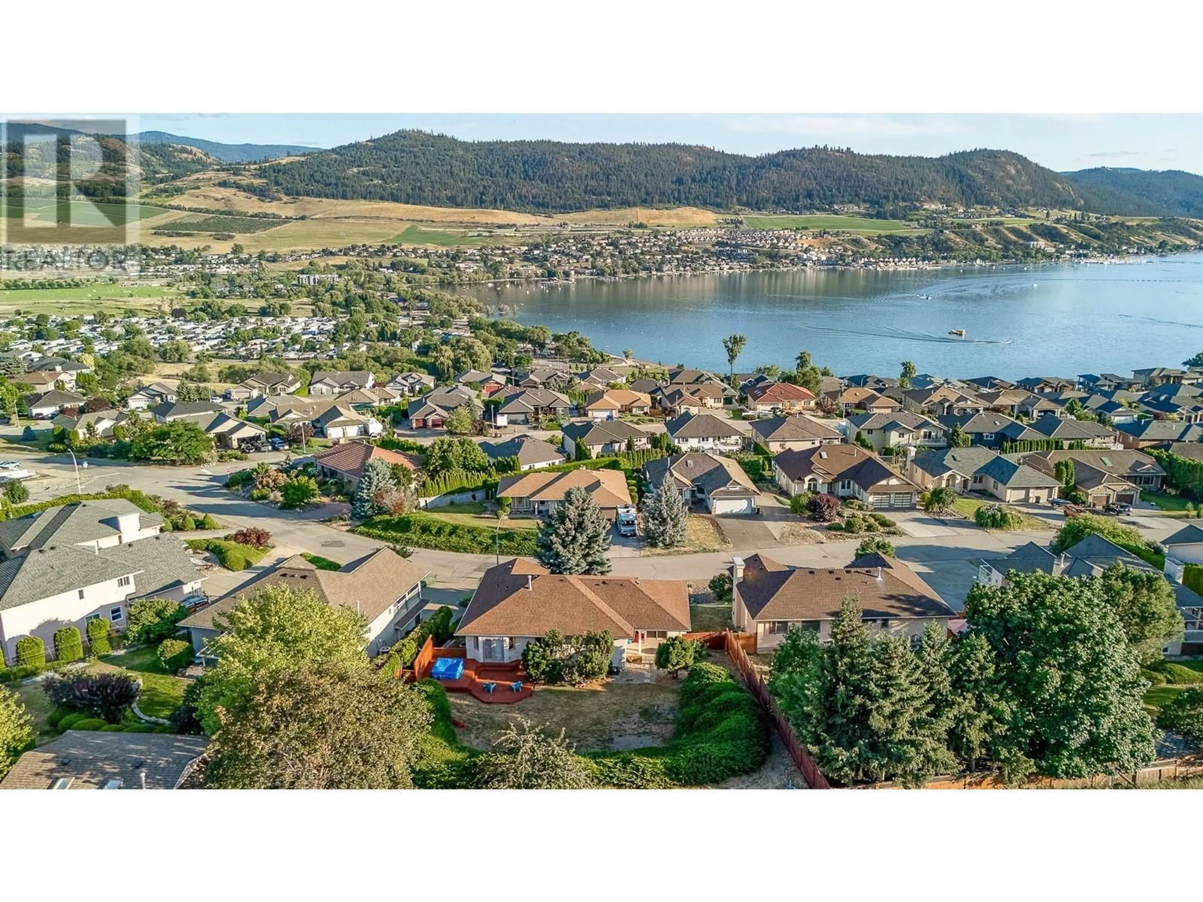 A pic from outside/outdoor area/front of a property/back of a property/a pic from drone, water/lake/river/ocean view for 7067 AMBER DRIVE, Vernon British Columbia V1H1P4