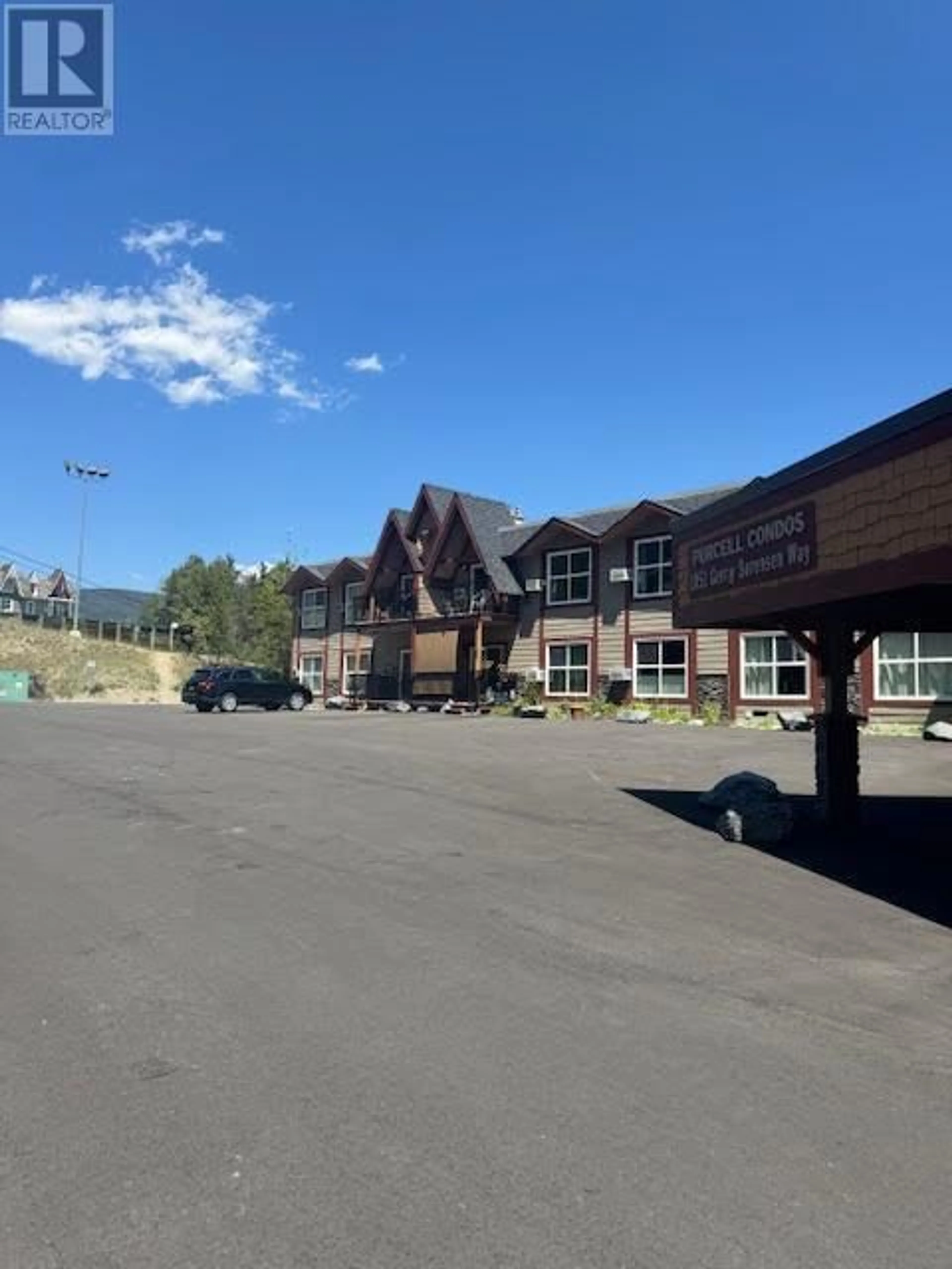 A pic from outside/outdoor area/front of a property/back of a property/a pic from drone, mountain view for 122-124 - 1051 GERRY SORENSEN WAY, Kimberley British Columbia V1A2Y6