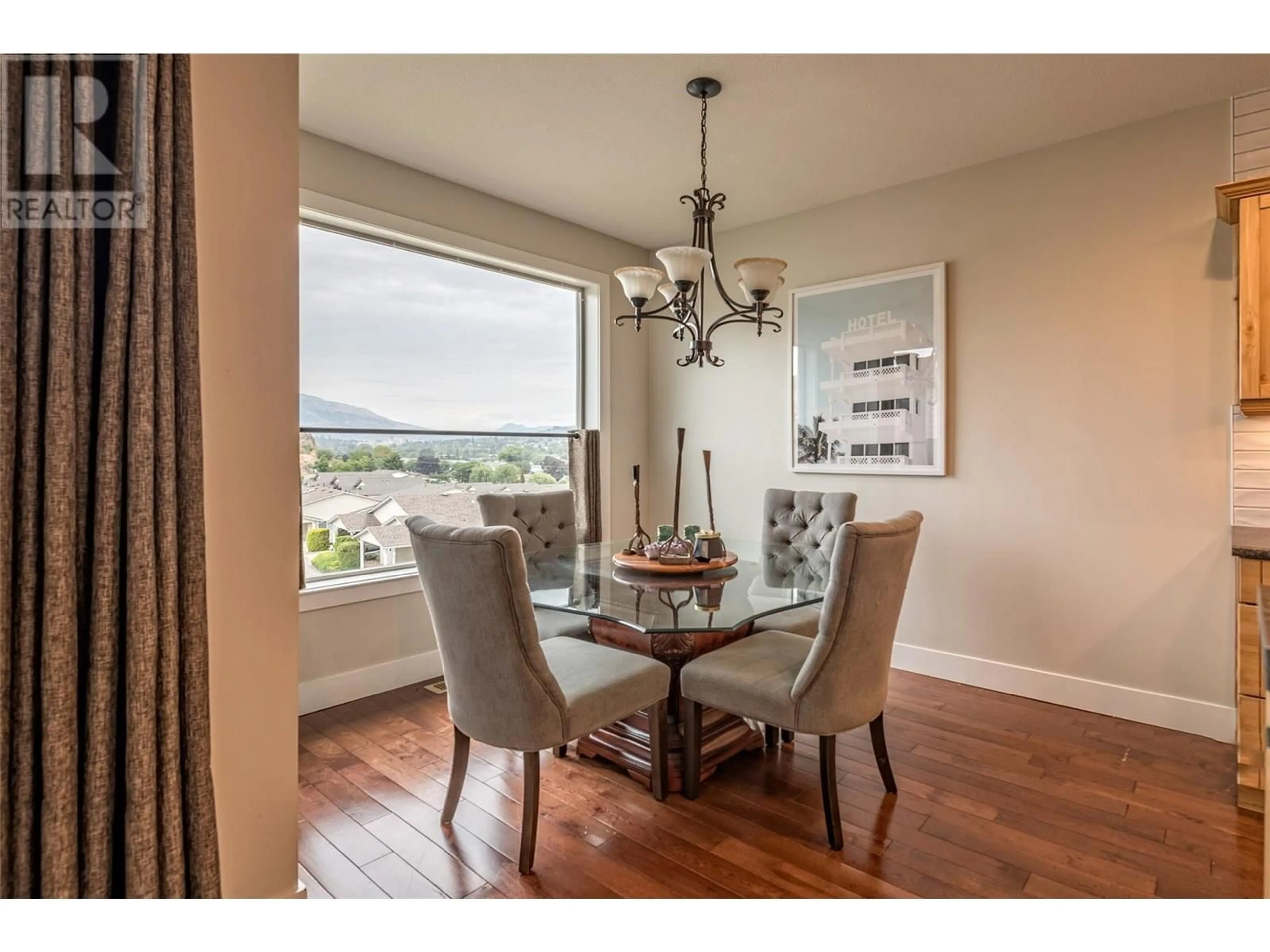 Dining room, wood/laminate floor for 7 - 4724 HERITAGE DRIVE, Vernon British Columbia V1T7V4