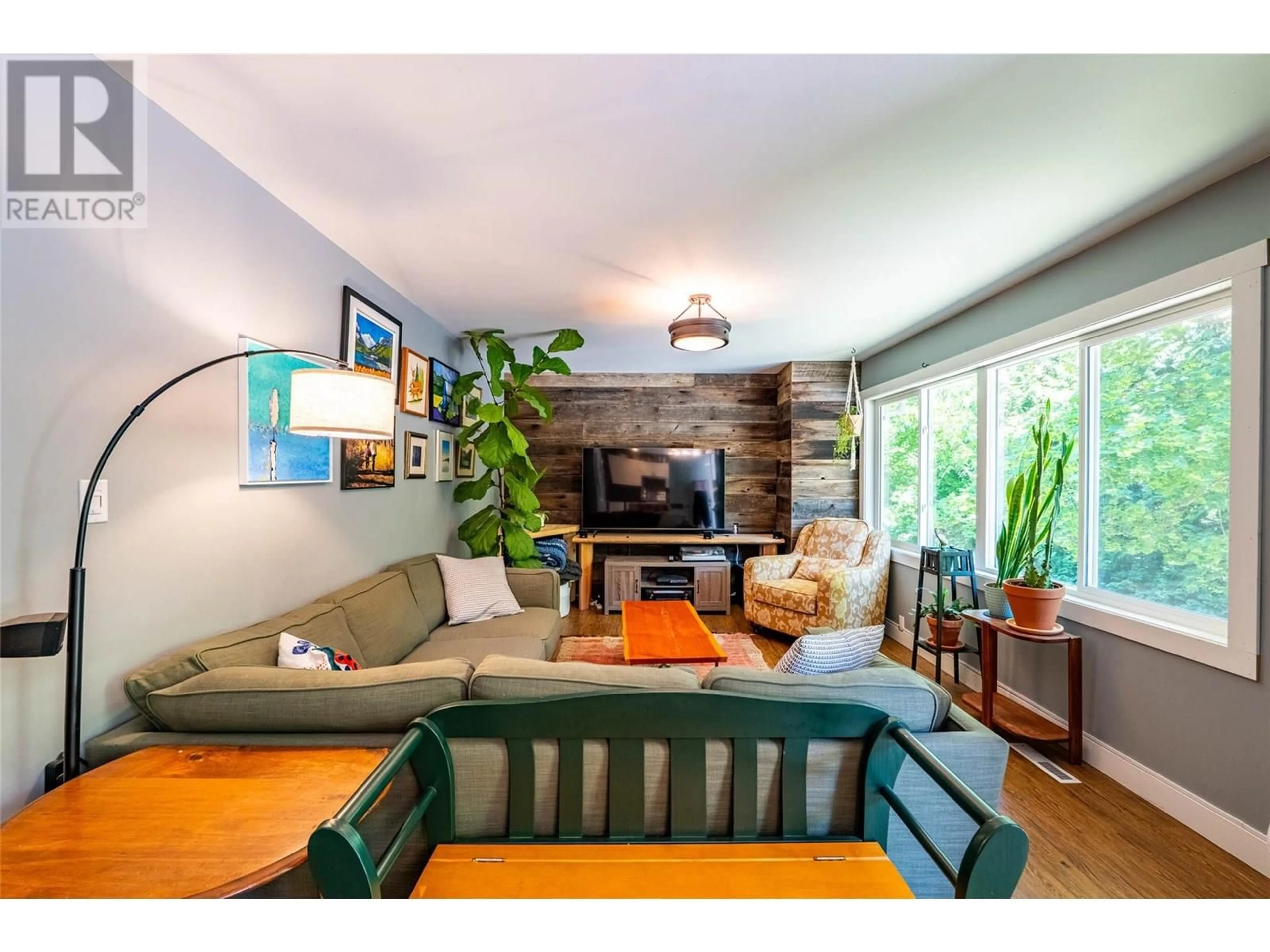 Living room with furniture, wood/laminate floor for 1801 3A HIGHWAY, Castlegar British Columbia V1N3E2