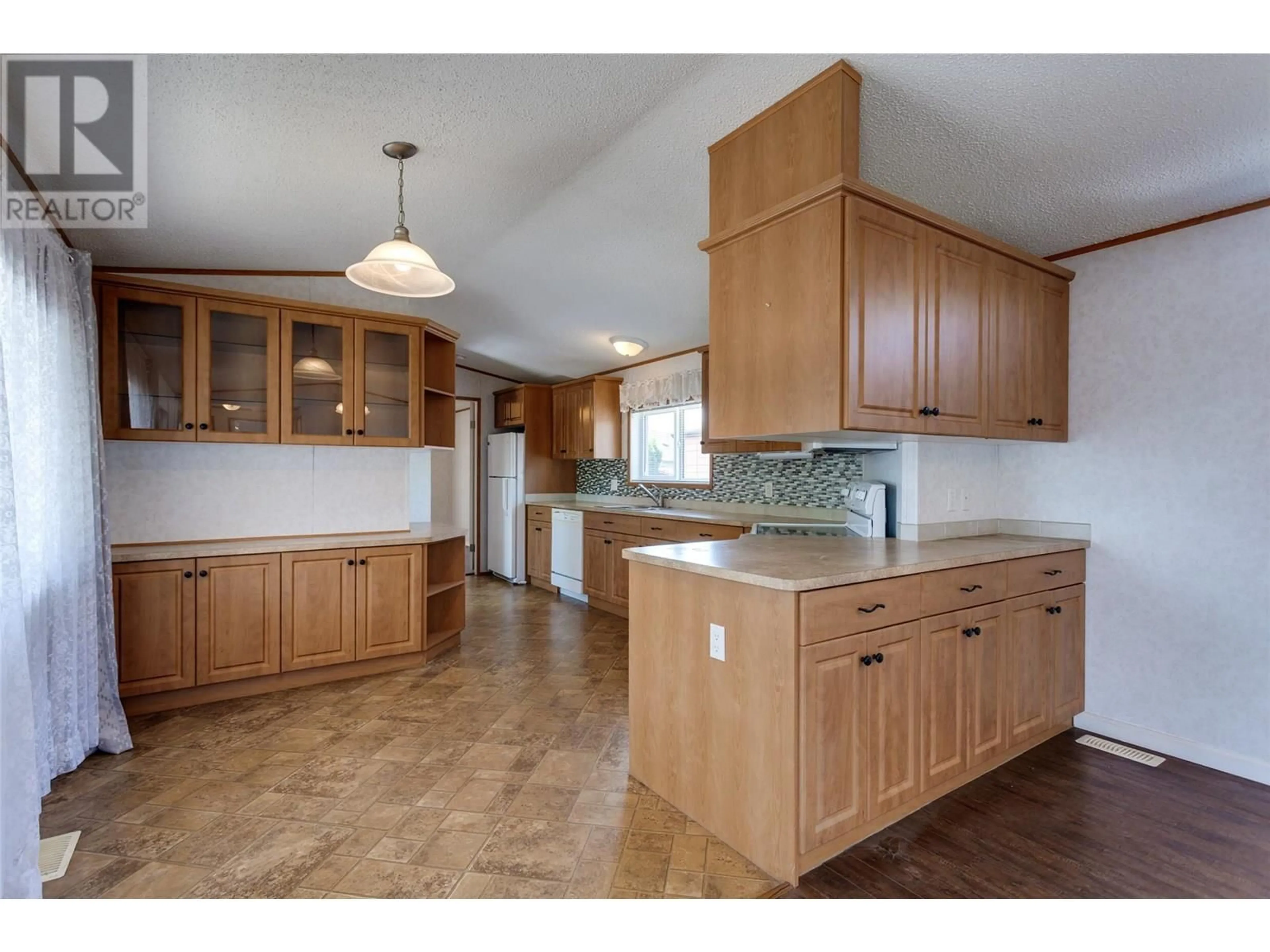 Open concept kitchen, unknown for 138 - 1133 FINDLAY ROAD, Kelowna British Columbia V1X5A8