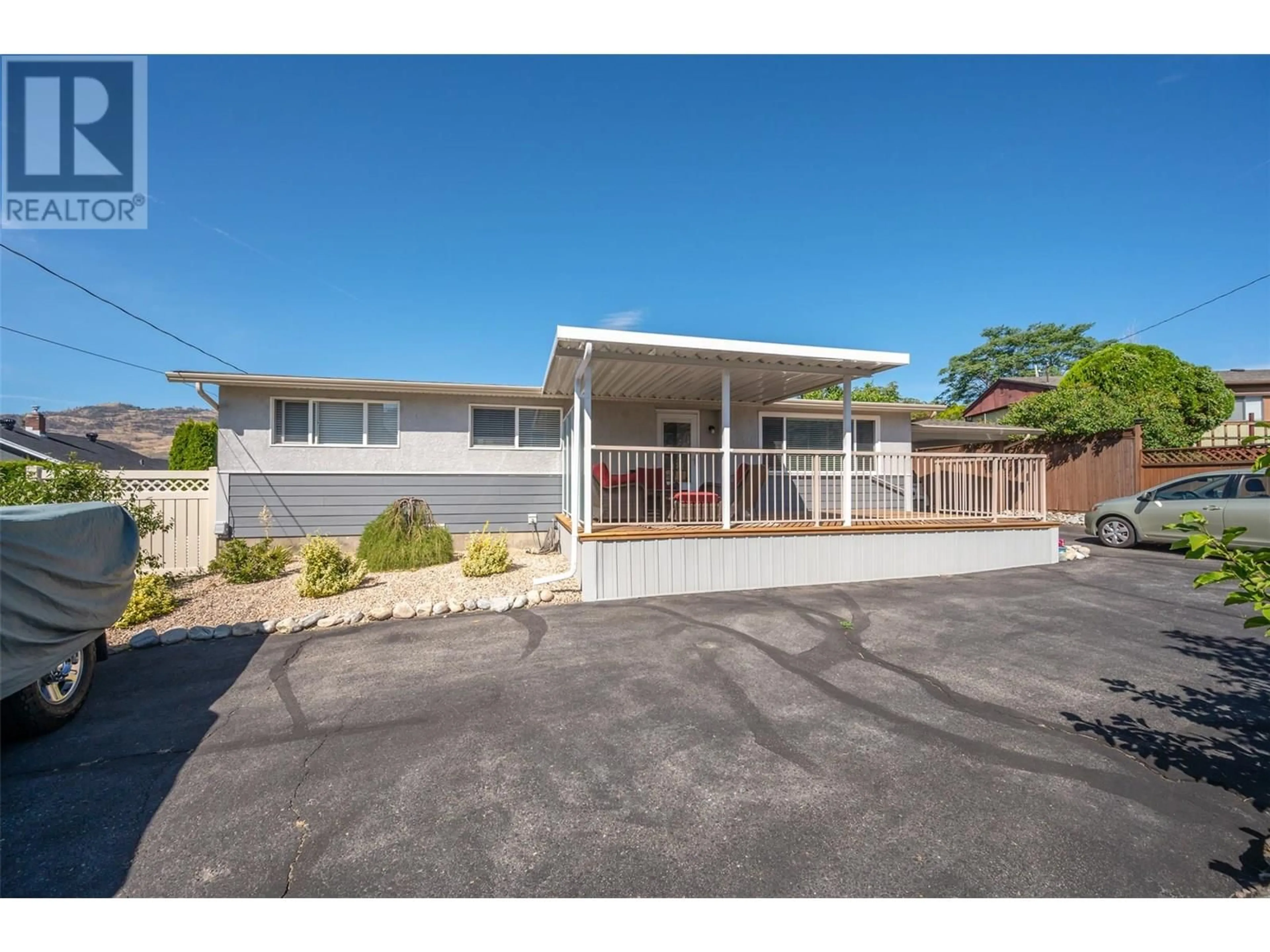 A pic from outside/outdoor area/front of a property/back of a property/a pic from drone, street for 8 MCINTOSH COURT, Osoyoos British Columbia V0H1V2
