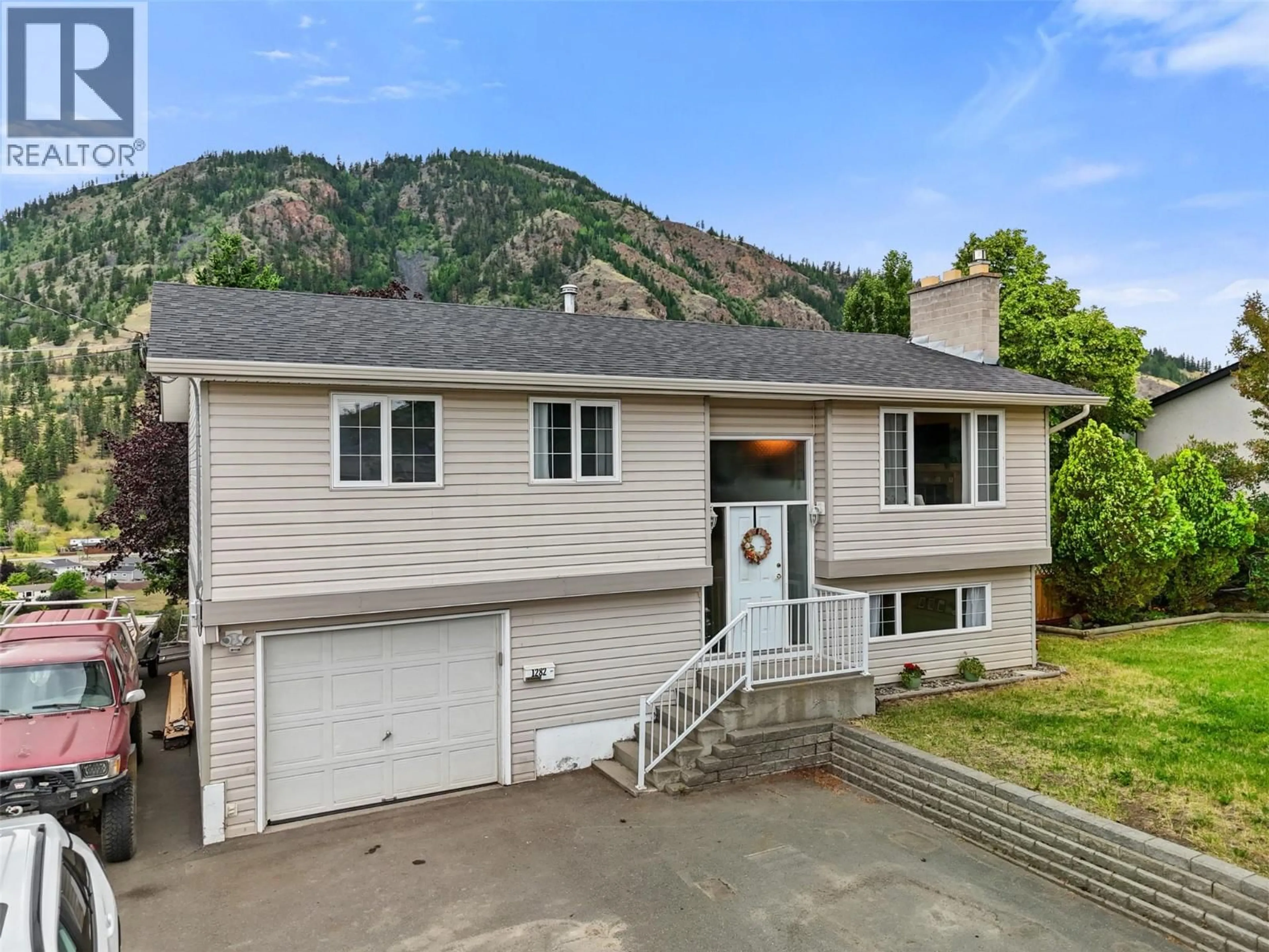 Home with vinyl exterior material, mountain view for 1282 HIGHRIDGE DRIVE, Kamloops British Columbia V2C5G6