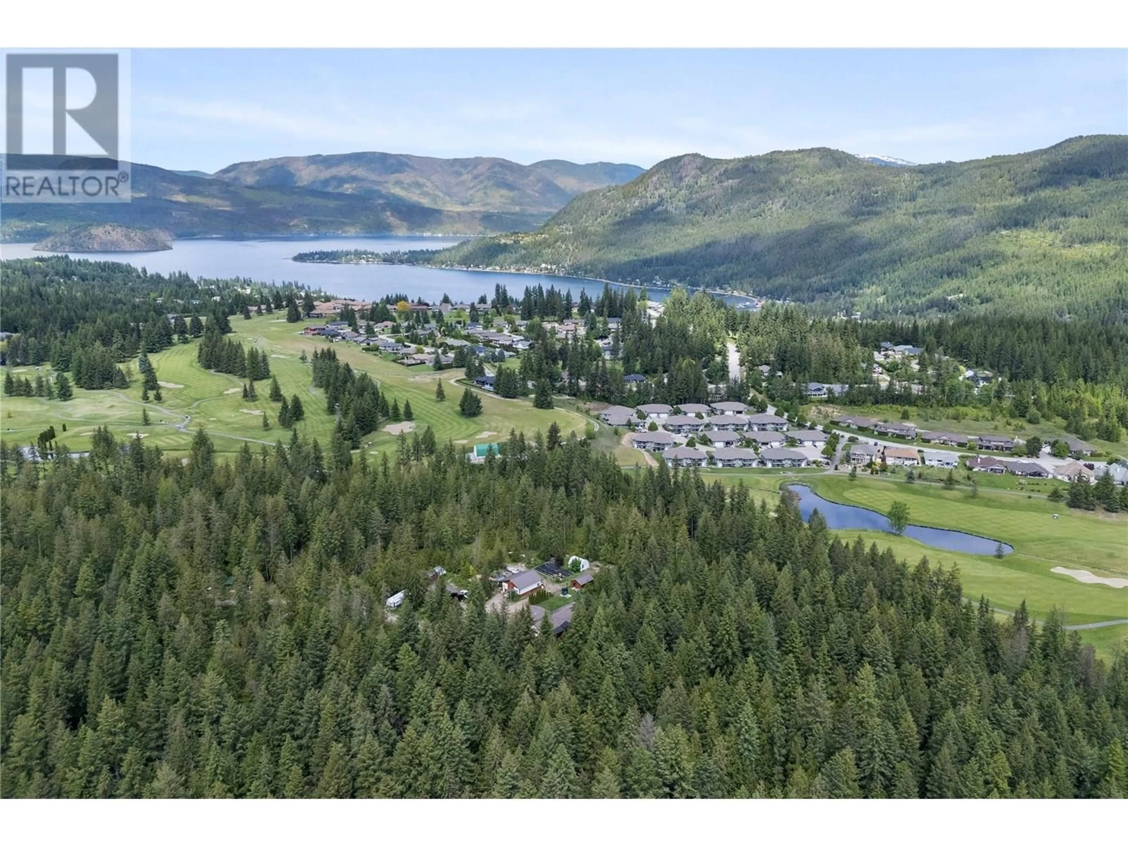 A pic from outside/outdoor area/front of a property/back of a property/a pic from drone, mountain view for 2681 TRANS CANADA HWY. OTHER, Sorrento British Columbia V0E2W0