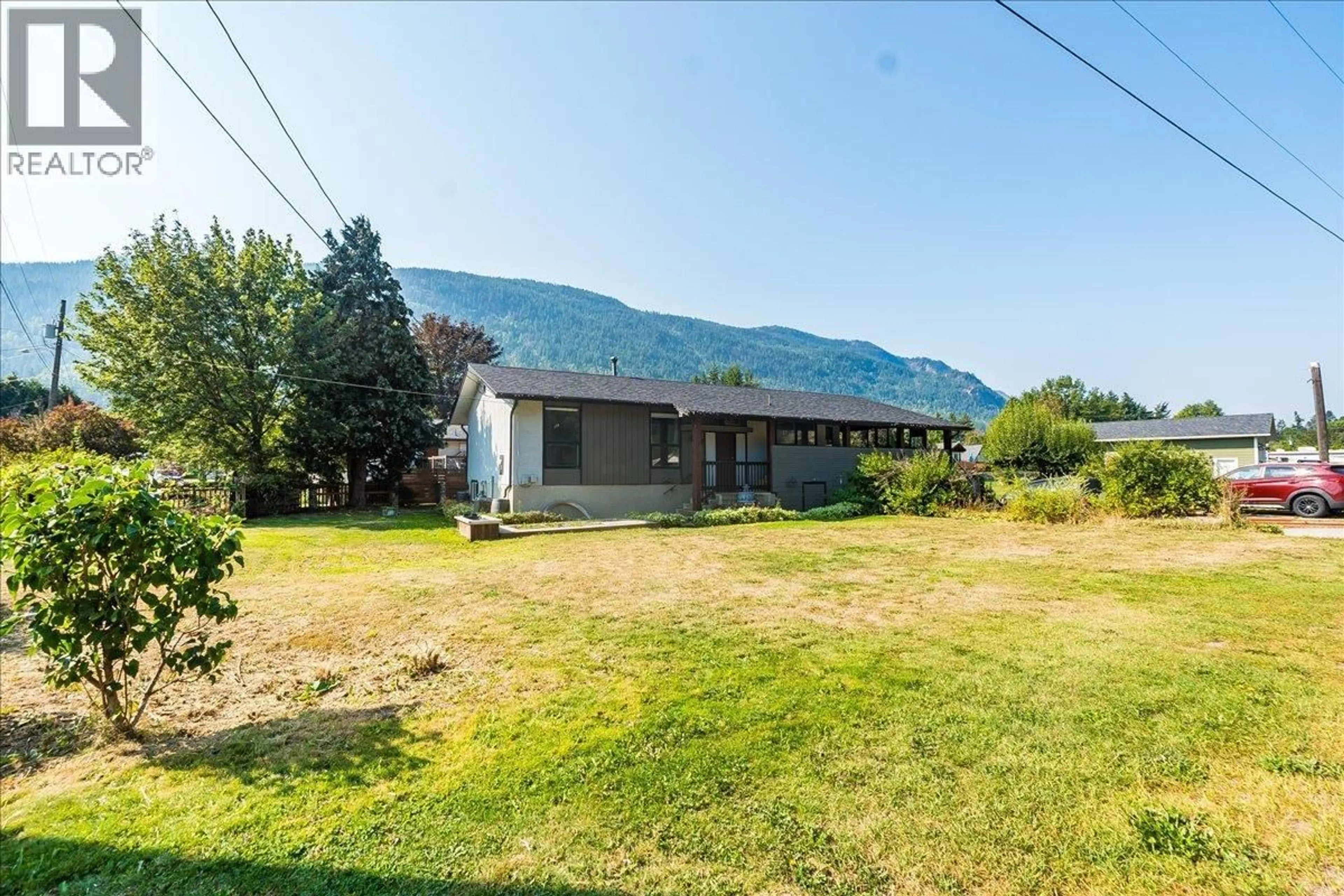 A pic from outside/outdoor area/front of a property/back of a property/a pic from drone, mountain view for 1056 CLARKE ROAD, Castlegar British Columbia V0G1X0