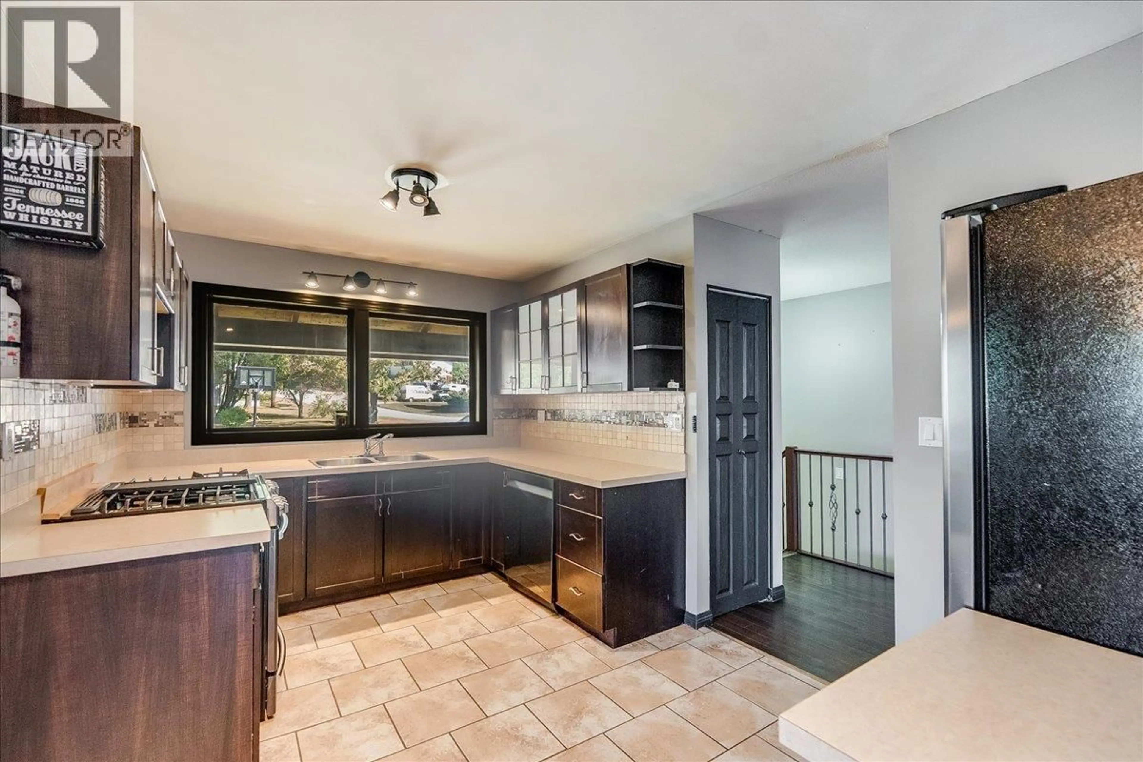 Open concept kitchen, ceramic/tile floor for 1056 CLARKE ROAD, Castlegar British Columbia V0G1X0