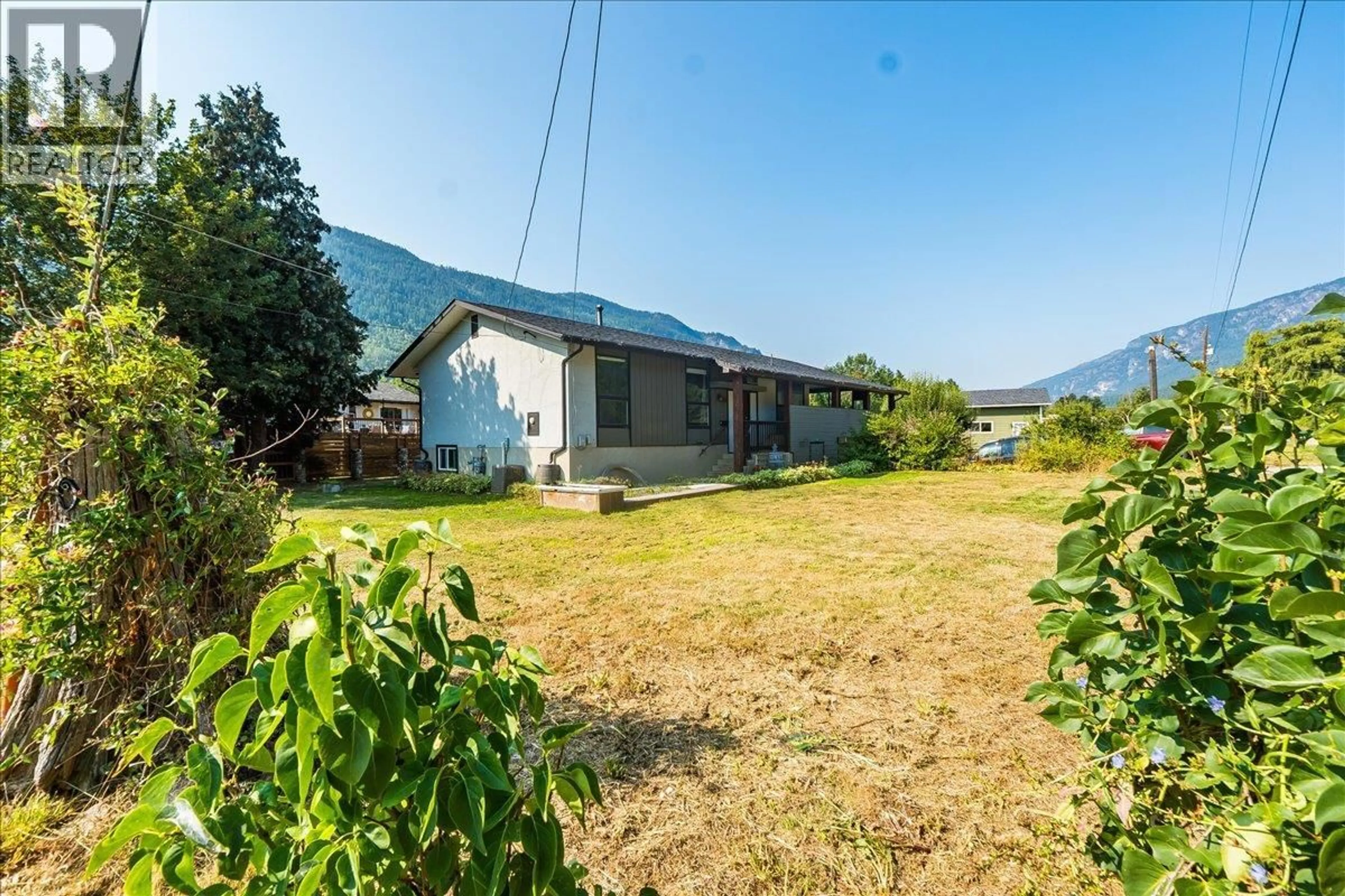 A pic from outside/outdoor area/front of a property/back of a property/a pic from drone, mountain view for 1056 CLARKE ROAD, Castlegar British Columbia V0G1X0