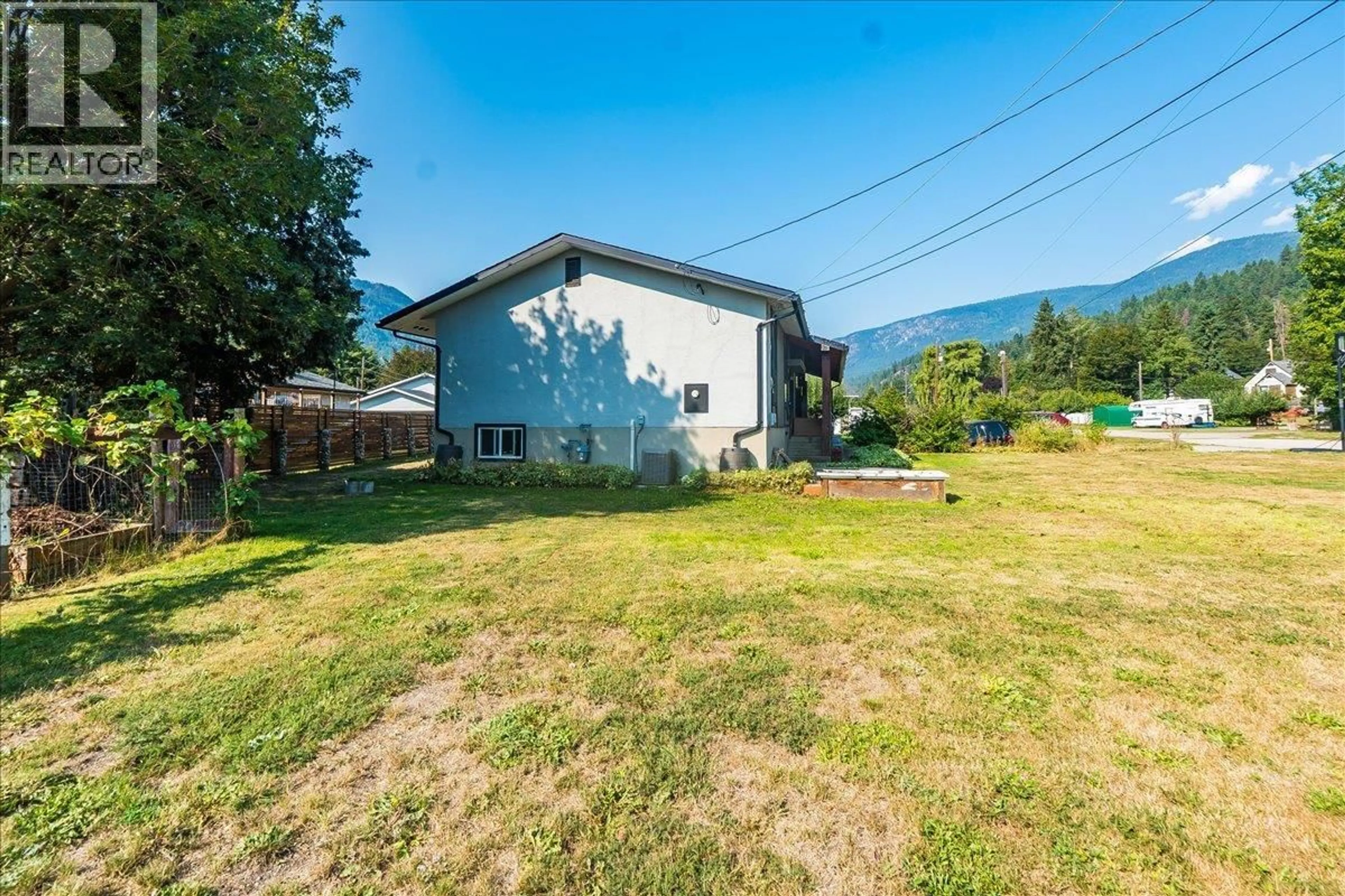 A pic from outside/outdoor area/front of a property/back of a property/a pic from drone, mountain view for 1056 CLARKE ROAD, Castlegar British Columbia V0G1X0