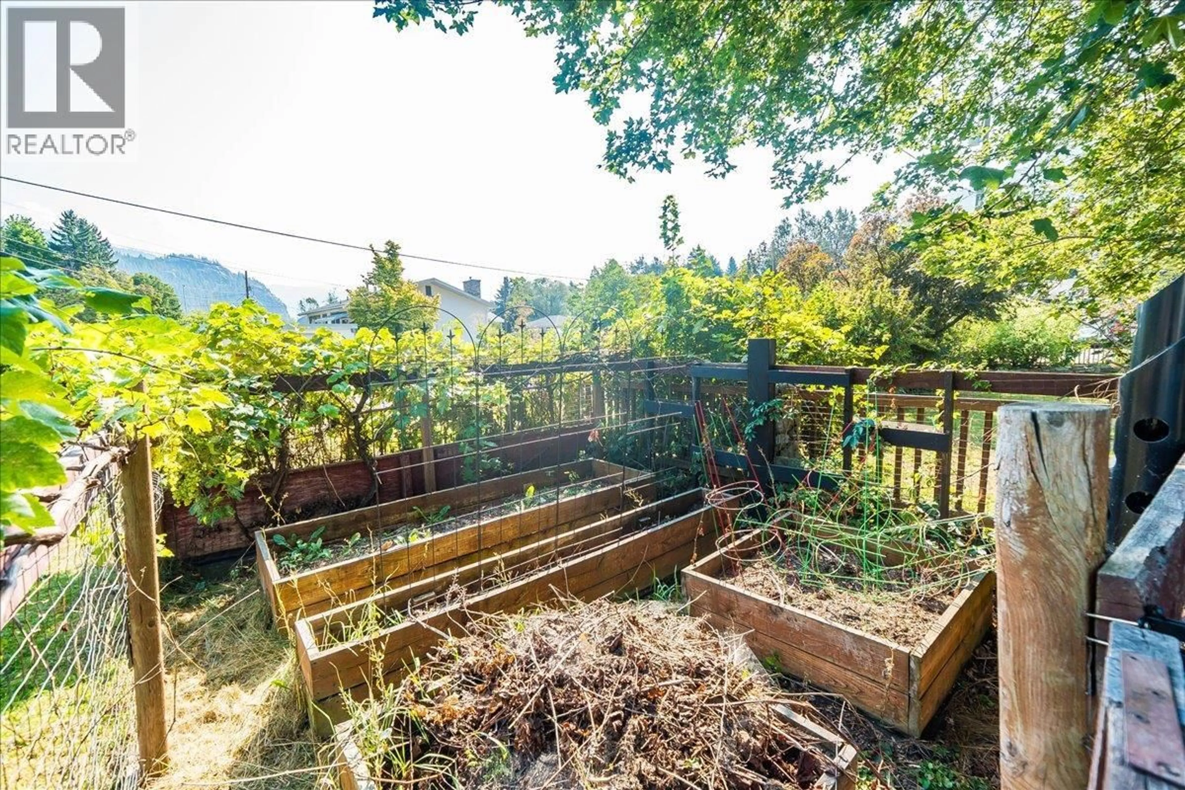 Patio, forest/trees view for 1056 CLARKE ROAD, Castlegar British Columbia V0G1X0