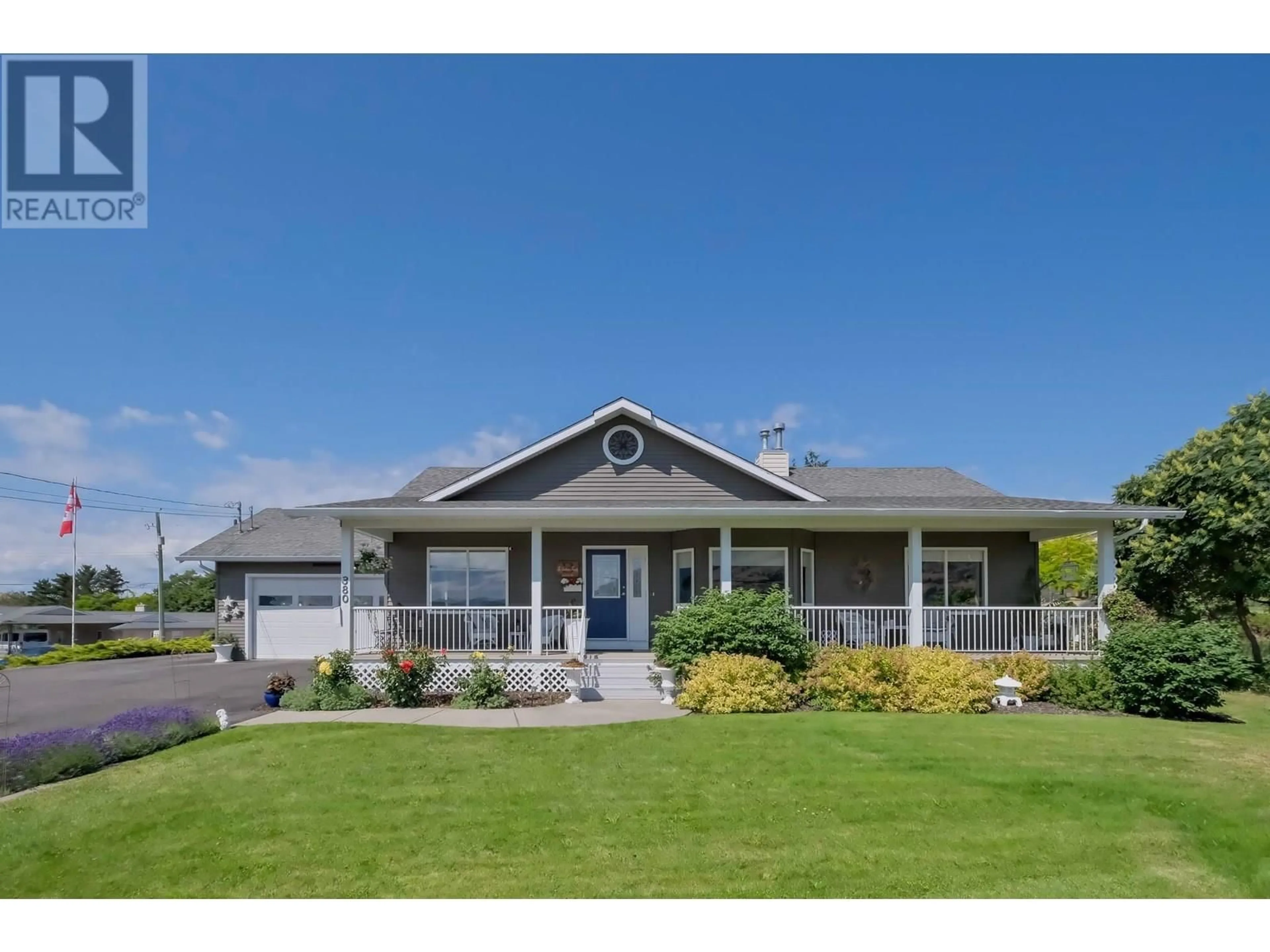 Home with vinyl exterior material, street for 380 SARSONS ROAD, Coldstream British Columbia V1B2M3