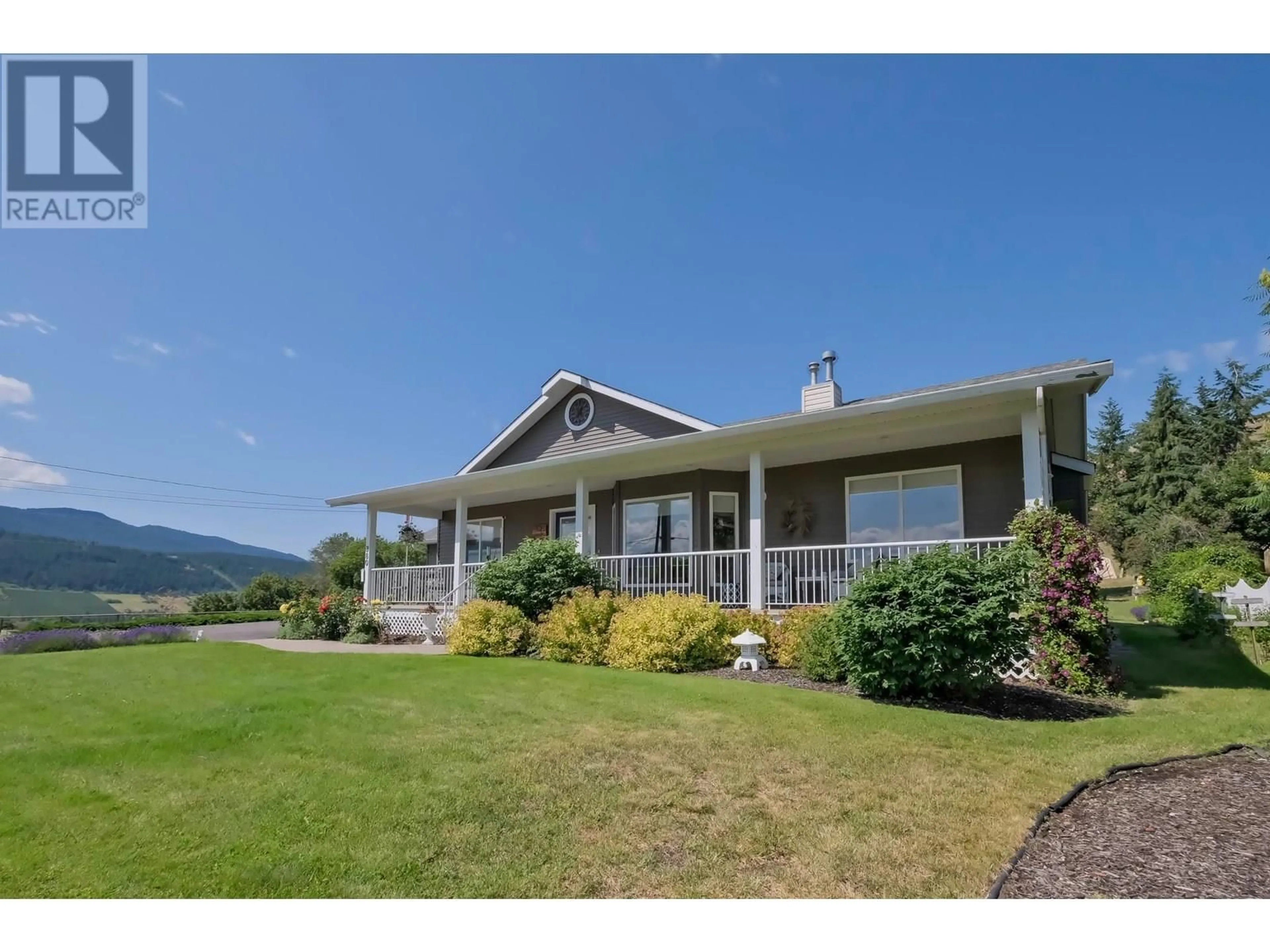 A pic from outside/outdoor area/front of a property/back of a property/a pic from drone, mountain view for 380 SARSONS ROAD, Coldstream British Columbia V1B2M3