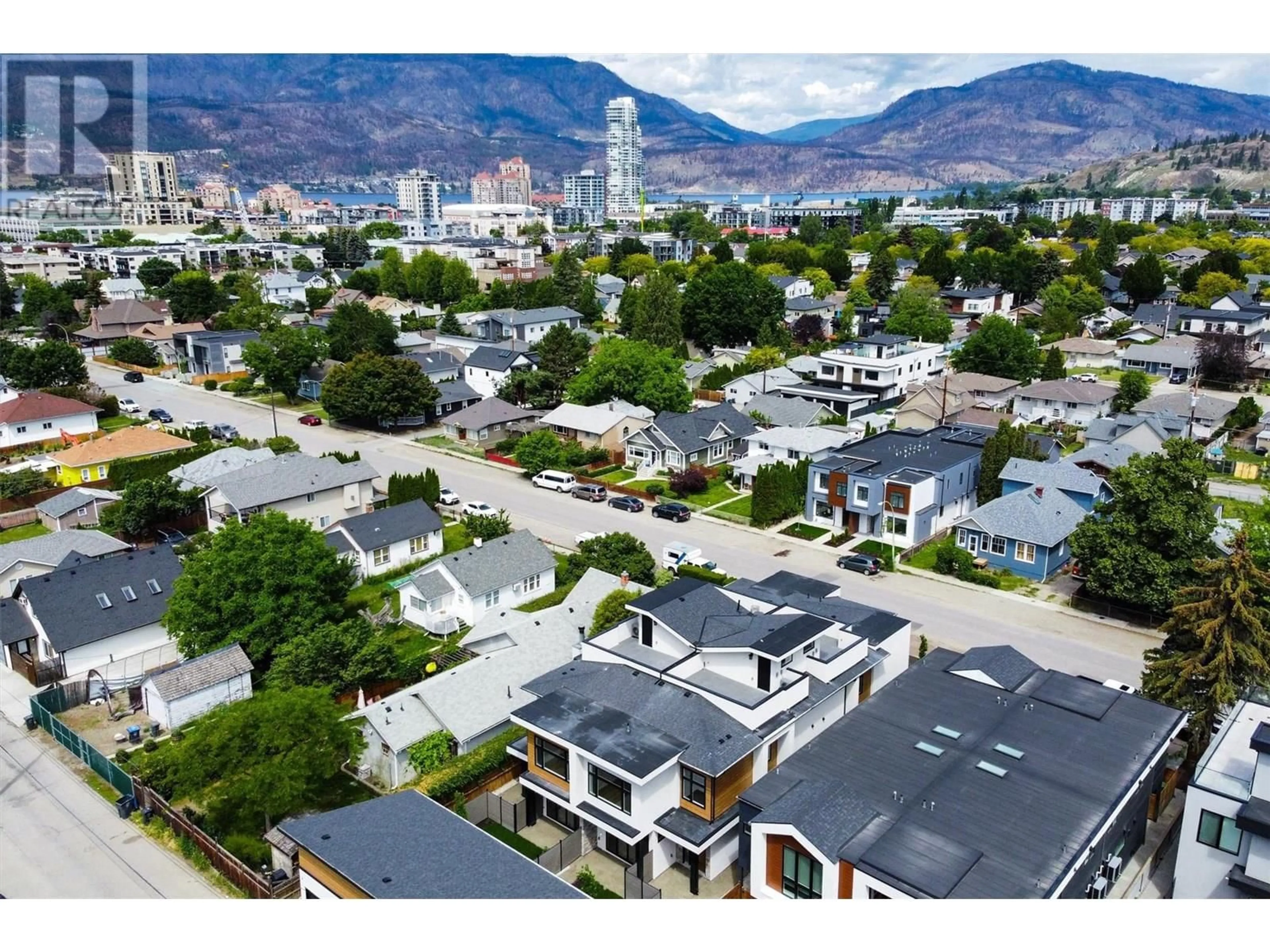 A pic from outside/outdoor area/front of a property/back of a property/a pic from drone, mountain view for 3 - 839 LAWSON AVENUE, Kelowna British Columbia V1Y6S9
