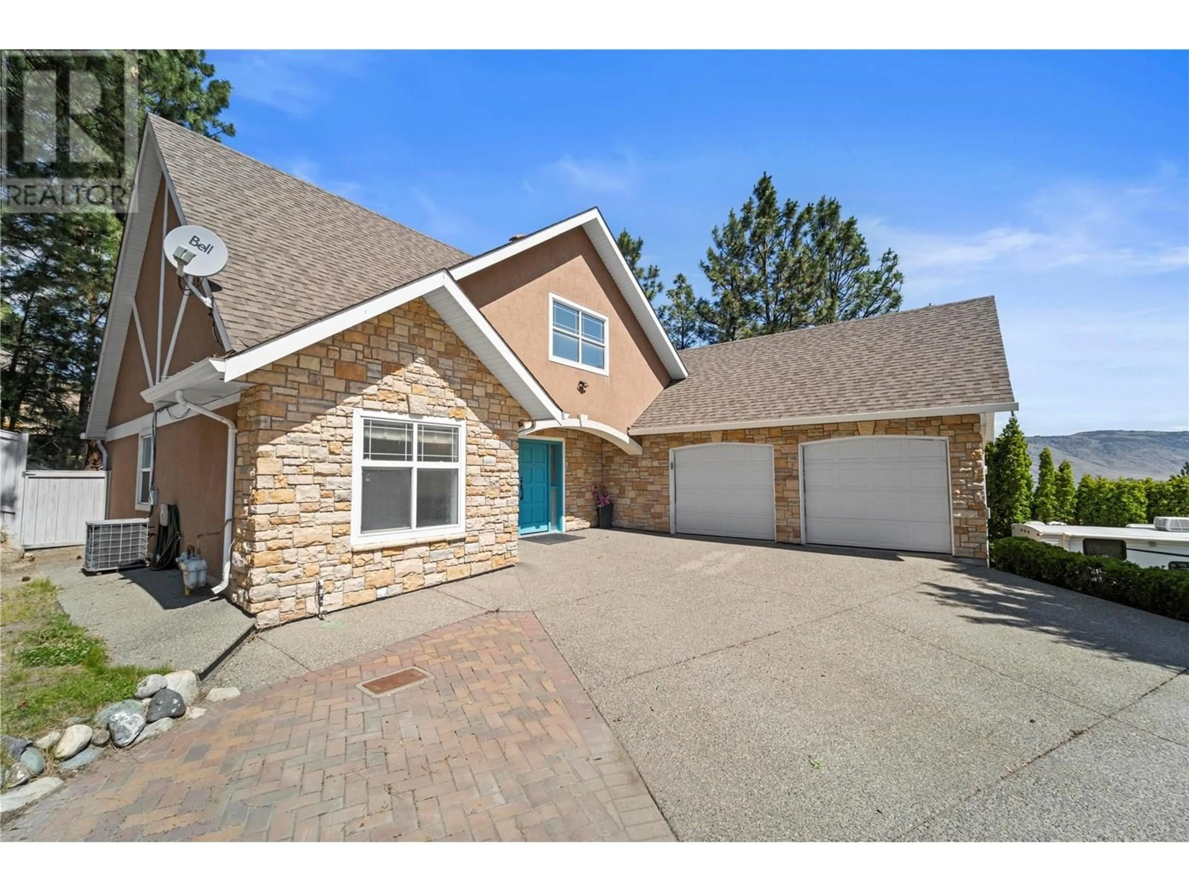 Home with brick exterior material, street for 1548 ASSINIBOINE ROAD, Kamloops British Columbia V2E2R1
