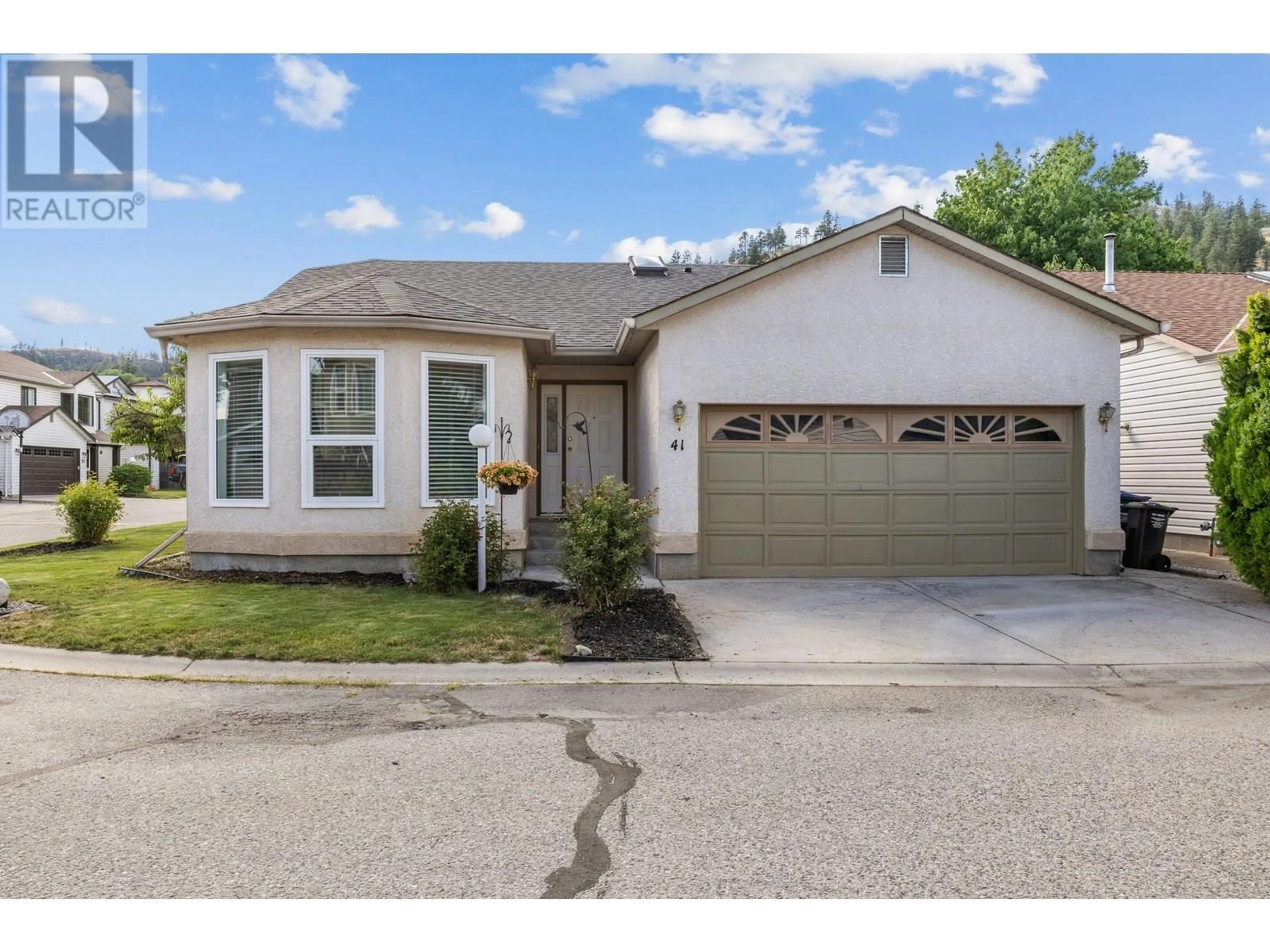 Home with vinyl exterior material, street for 41 - 555 GLENMEADOWS ROAD, Kelowna British Columbia V1V1V5