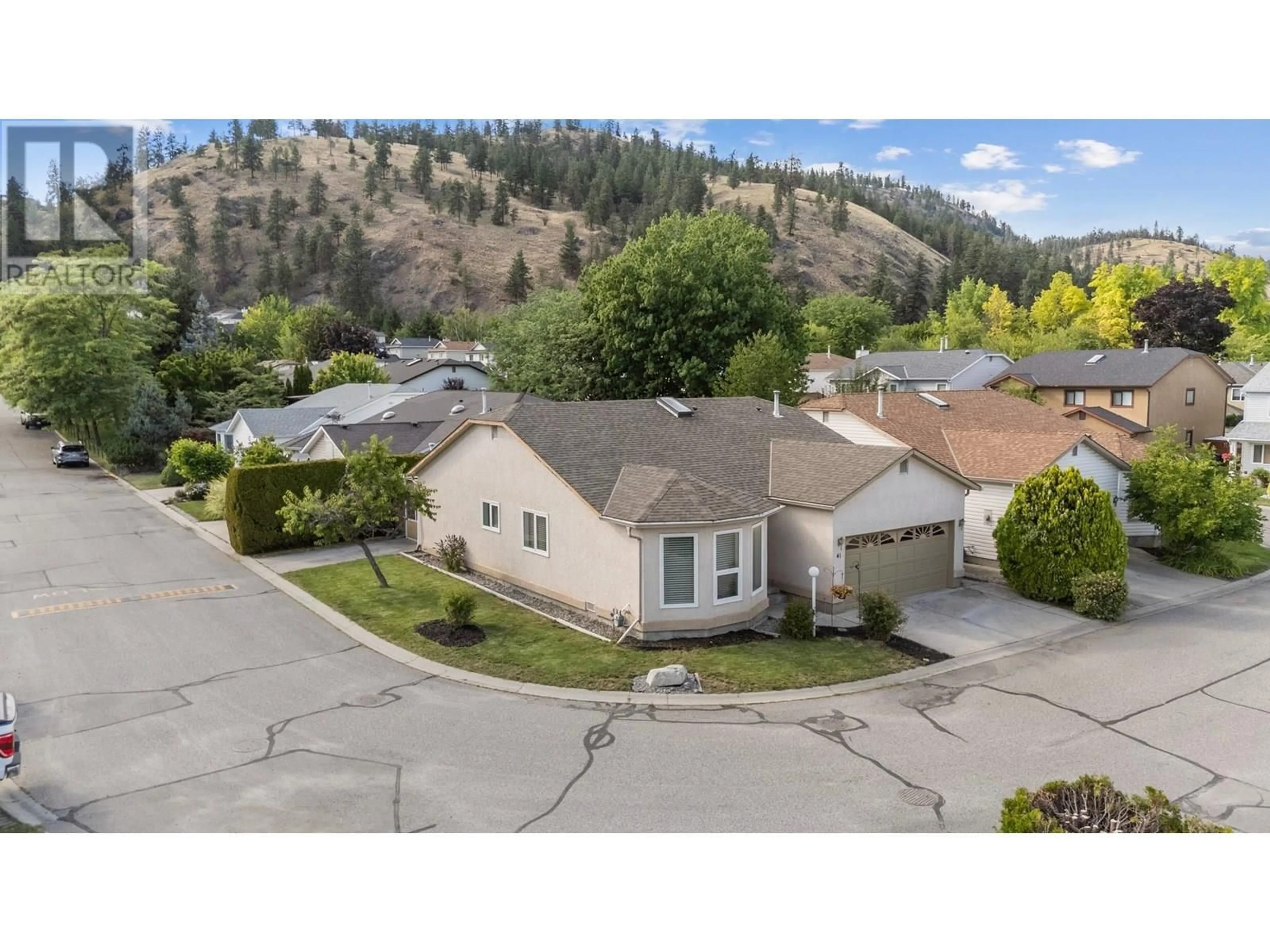 A pic from outside/outdoor area/front of a property/back of a property/a pic from drone, mountain view for 41 - 555 GLENMEADOWS ROAD, Kelowna British Columbia V1V1V5