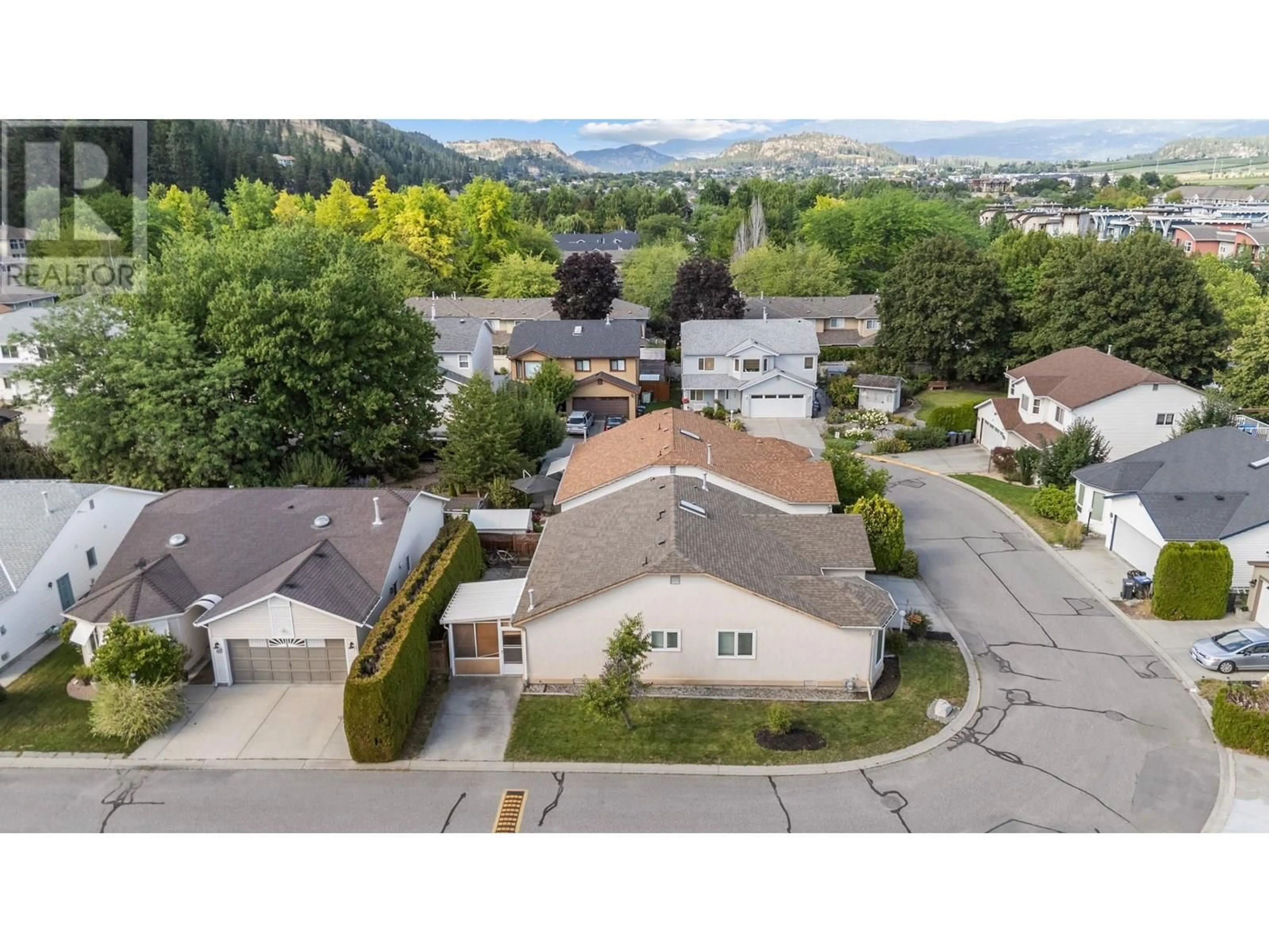 A pic from outside/outdoor area/front of a property/back of a property/a pic from drone, mountain view for 41 - 555 GLENMEADOWS ROAD, Kelowna British Columbia V1V1V5