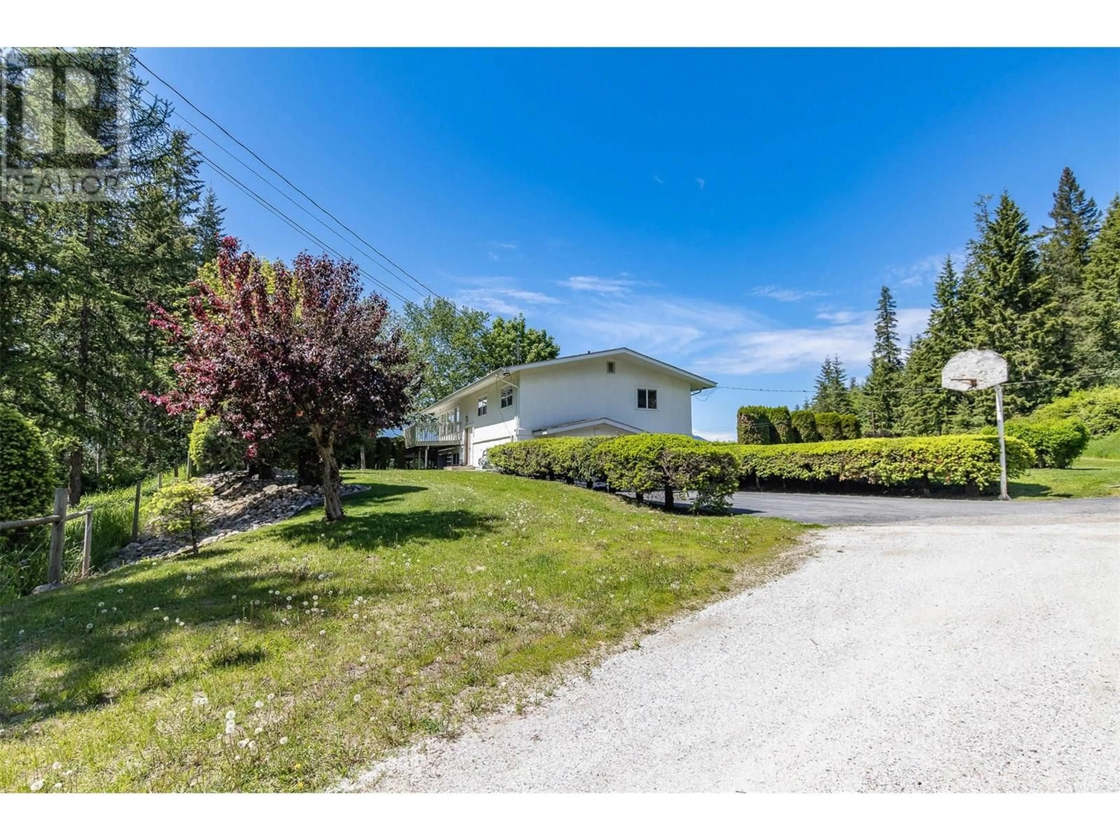 A pic from outside/outdoor area/front of a property/back of a property/a pic from drone, unknown for 3851 10 AVENUE SOUTHEAST, Salmon Arm British Columbia V1E1W7