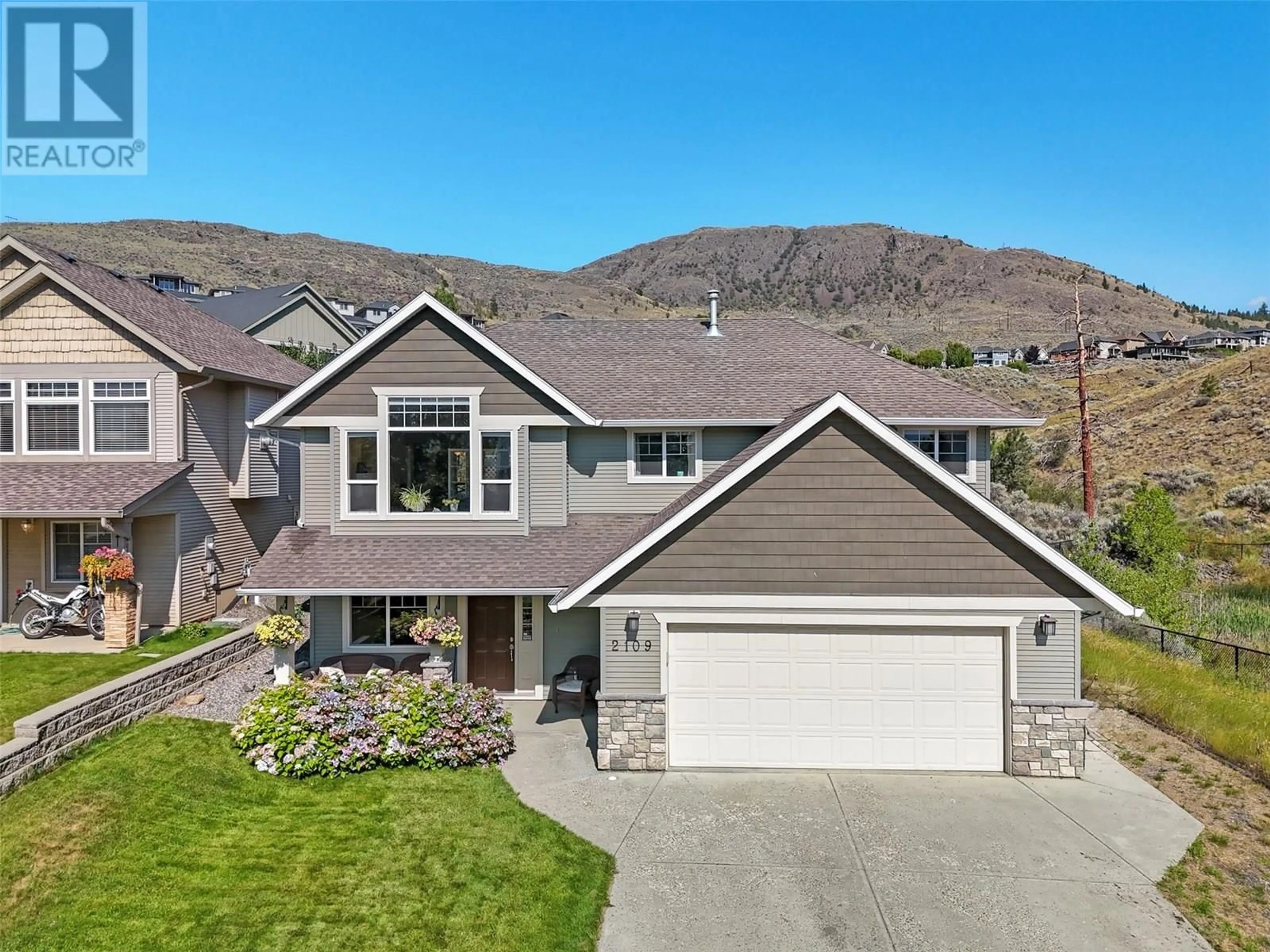 Home with vinyl exterior material, mountain view for 2109 GRASSLANDS BOULEVARD, Kamloops British Columbia V2B0A7