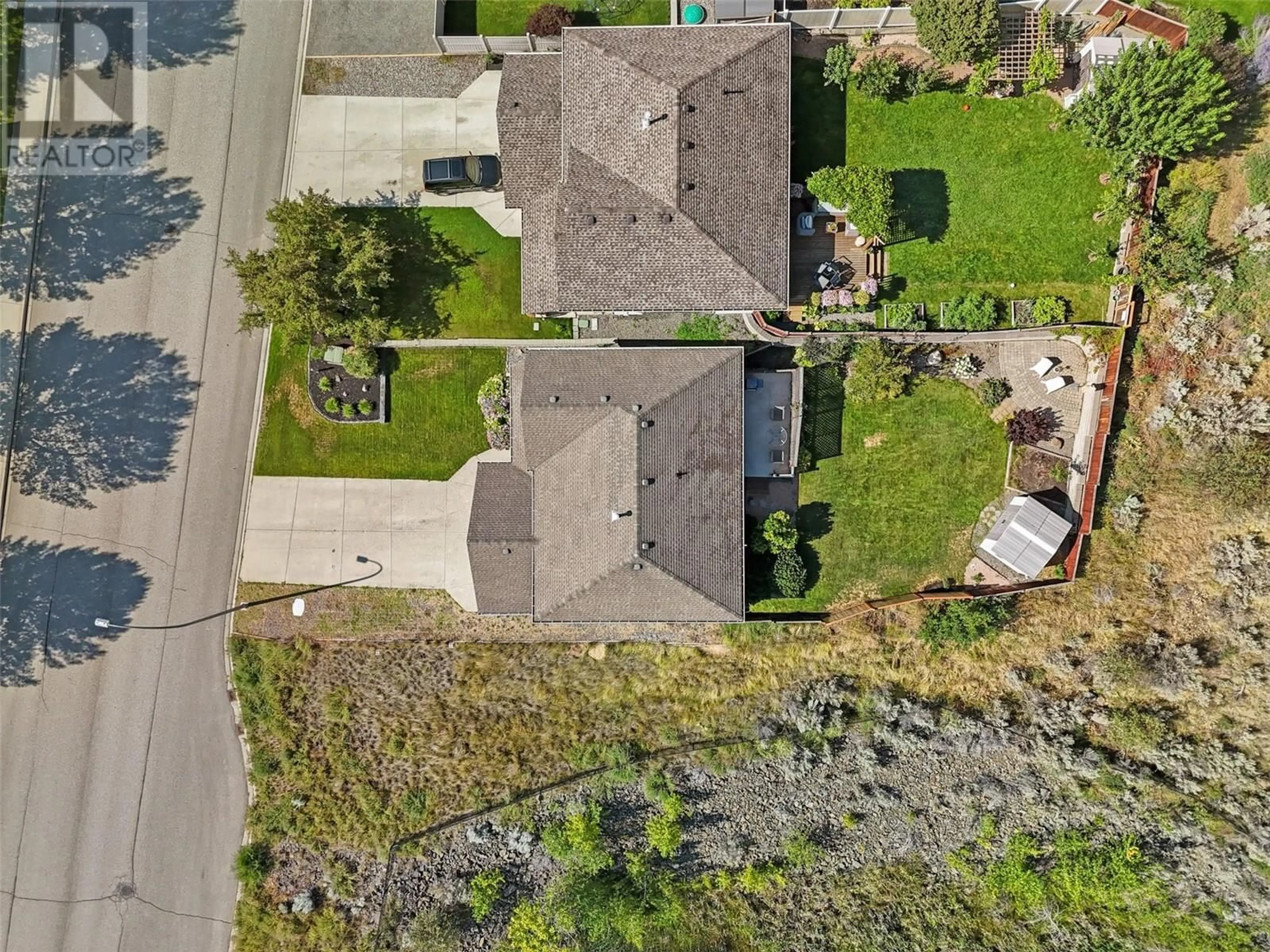 A pic from outside/outdoor area/front of a property/back of a property/a pic from drone, street for 2109 GRASSLANDS BOULEVARD, Kamloops British Columbia V2B0A7