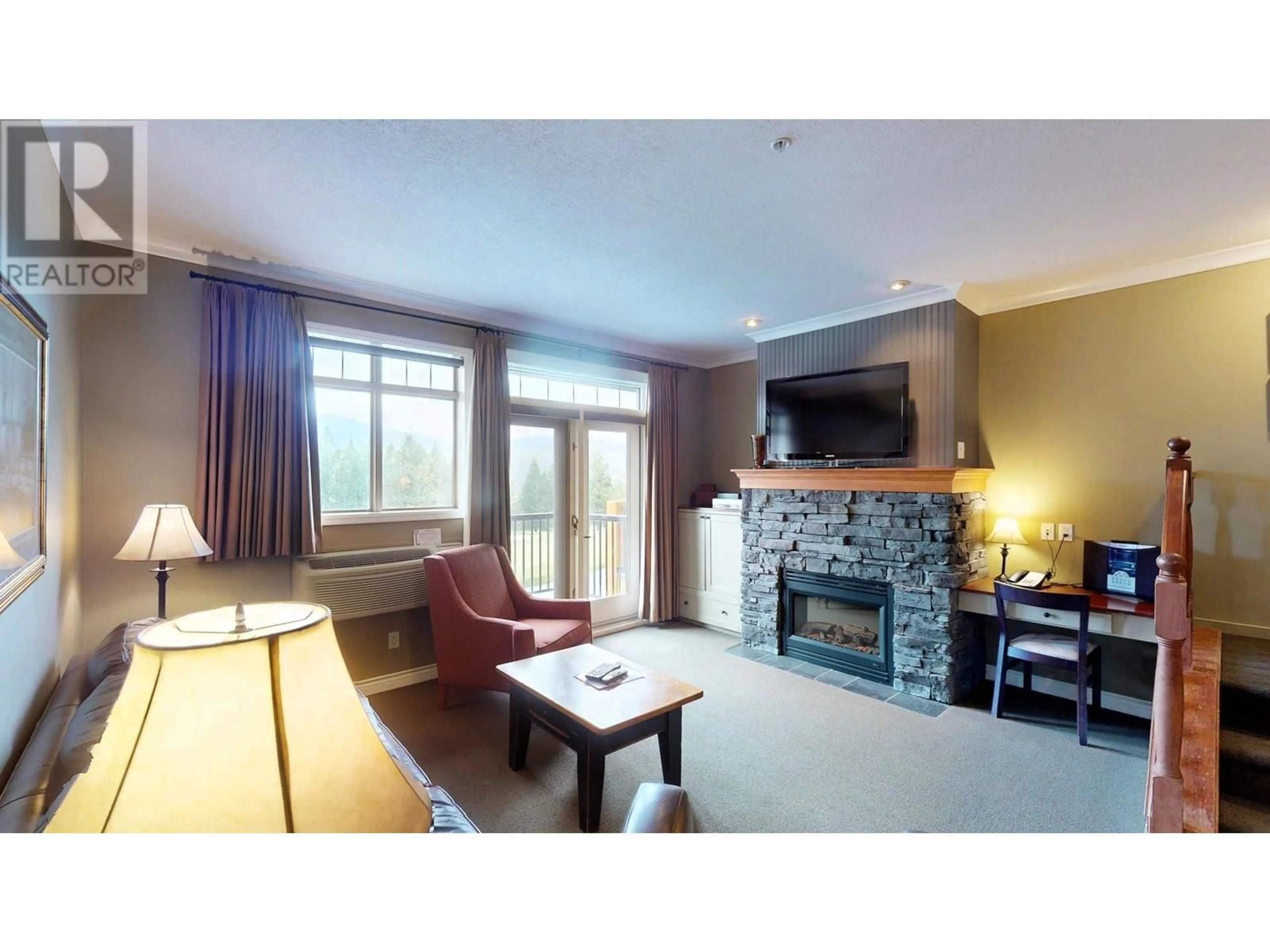 Living room with furniture, unknown for 232 - 200 BIGHORN BOULEVARD, Radium Hot Springs British Columbia V0A1M0