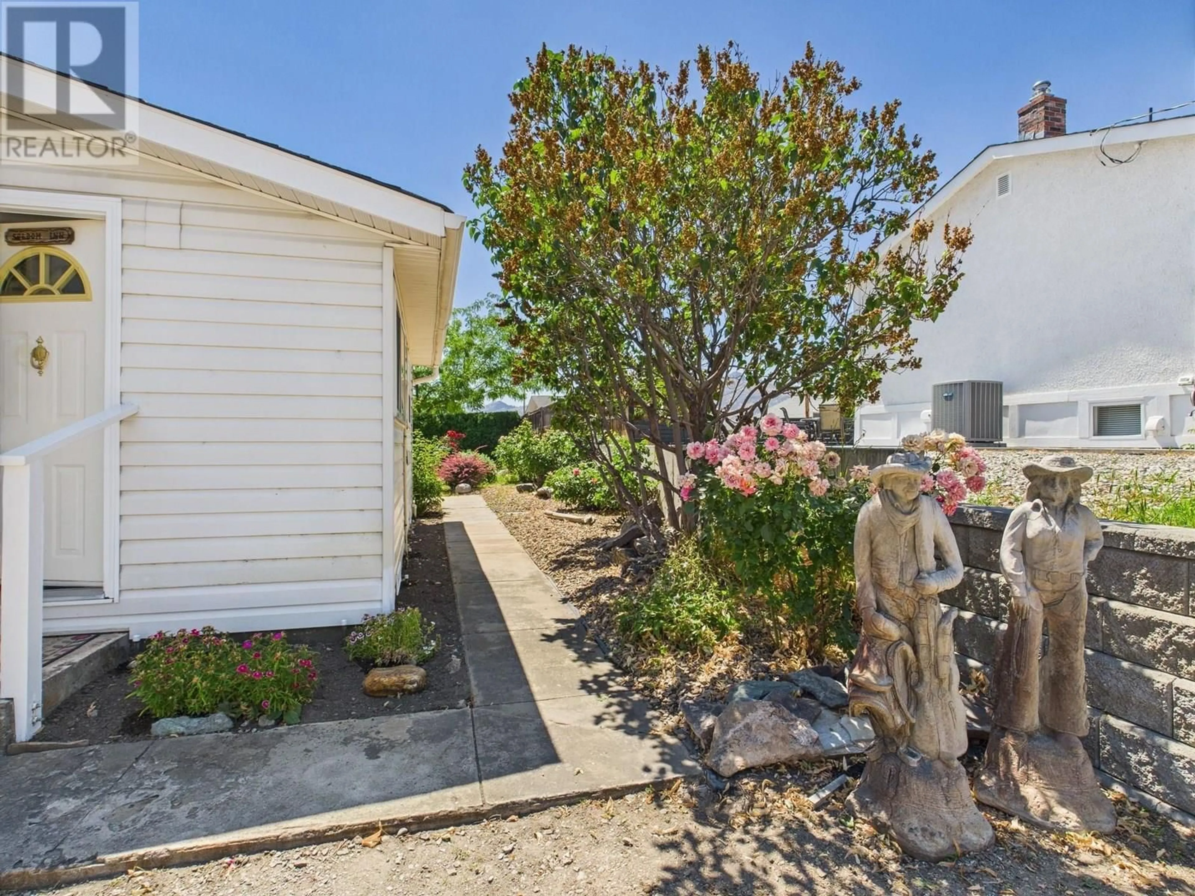 A pic from outside/outdoor area/front of a property/back of a property/a pic from drone, street for 8704 74TH AVENUE, Osoyoos British Columbia V0H1V1