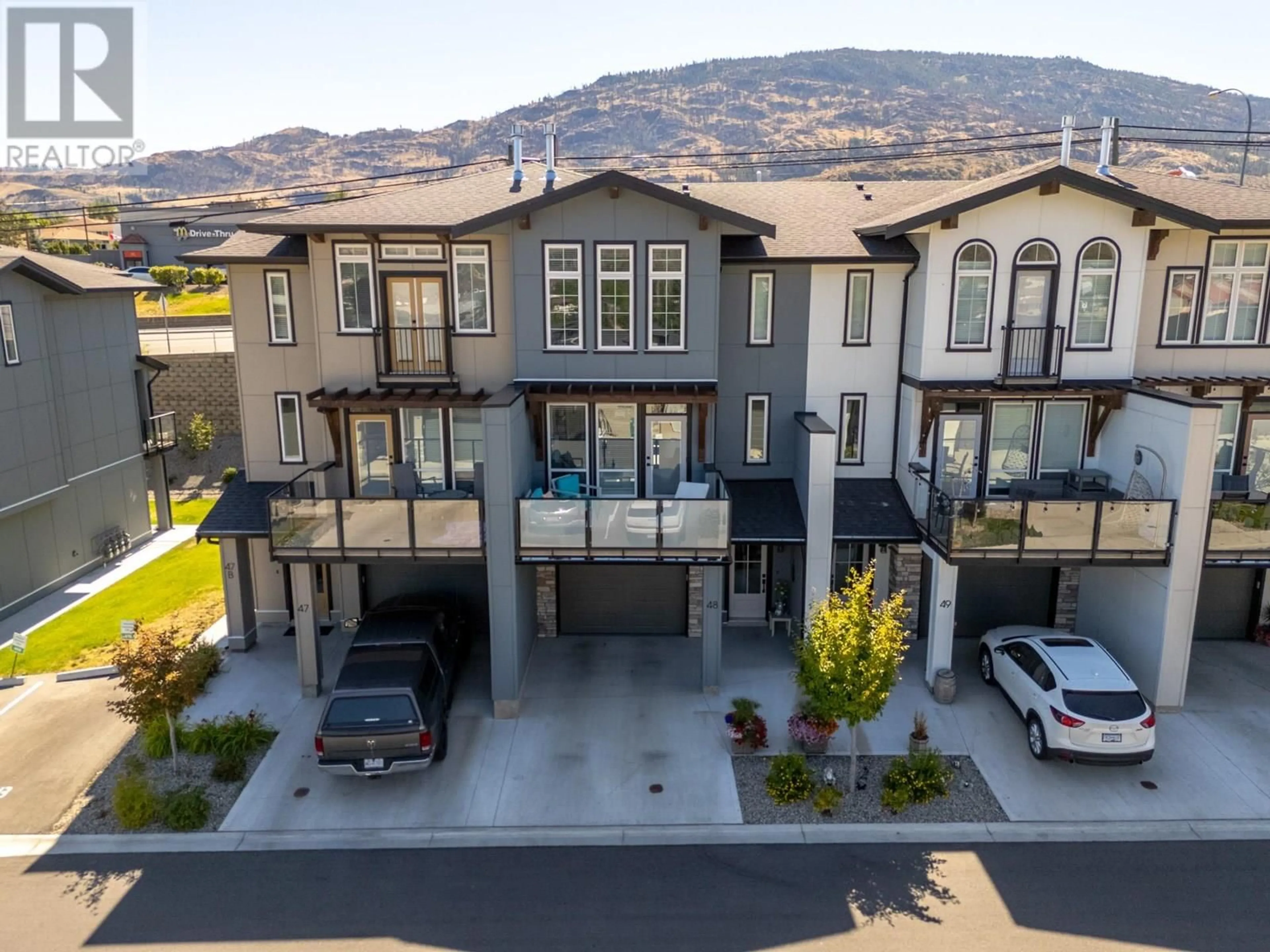 A pic from outside/outdoor area/front of a property/back of a property/a pic from drone, mountain view for 48 - 8000 VEDETTE DRIVE, Osoyoos British Columbia V0H1V2