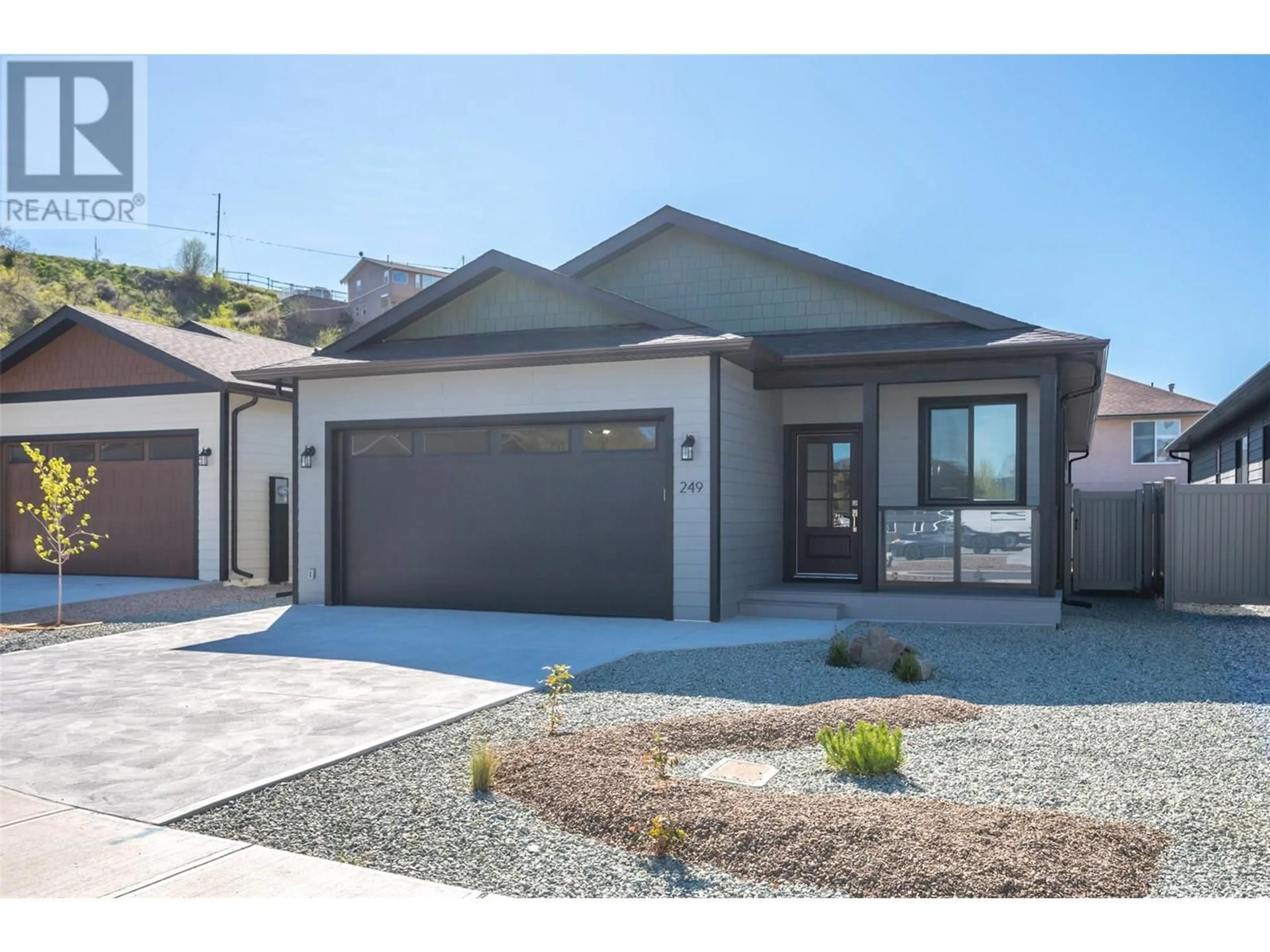 Home with brick exterior material, street for 249 BENTGRASS AVENUE, Oliver British Columbia V0H1T3
