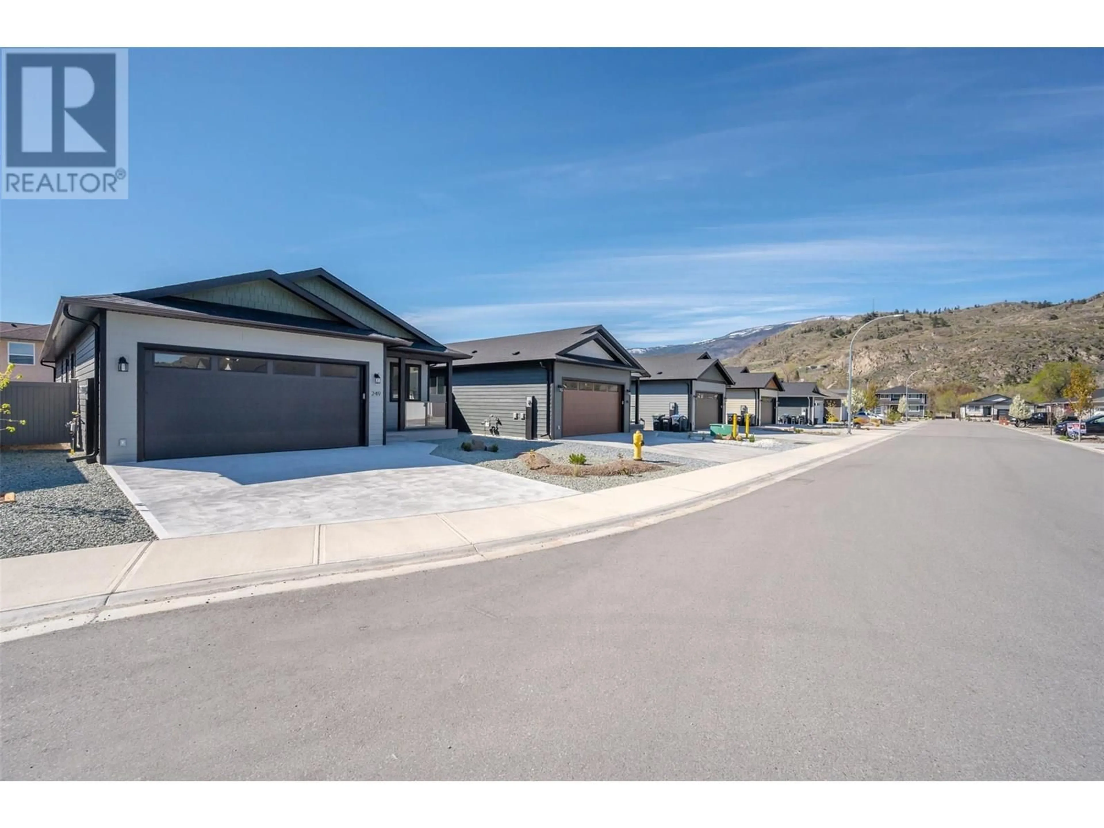 A pic from outside/outdoor area/front of a property/back of a property/a pic from drone, street for 249 BENTGRASS AVENUE, Oliver British Columbia V0H1T3