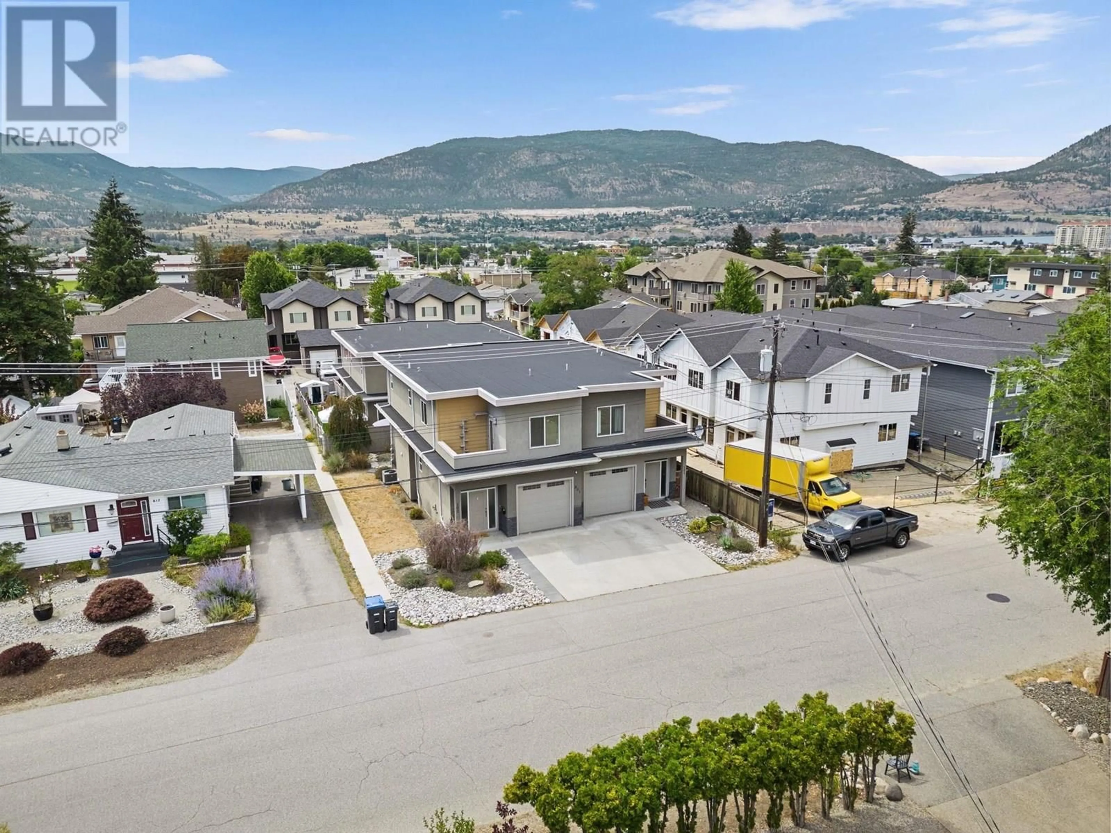 A pic from outside/outdoor area/front of a property/back of a property/a pic from drone, mountain view for 101 - 801 ONTARIO STREET, Penticton British Columbia V2A4S4