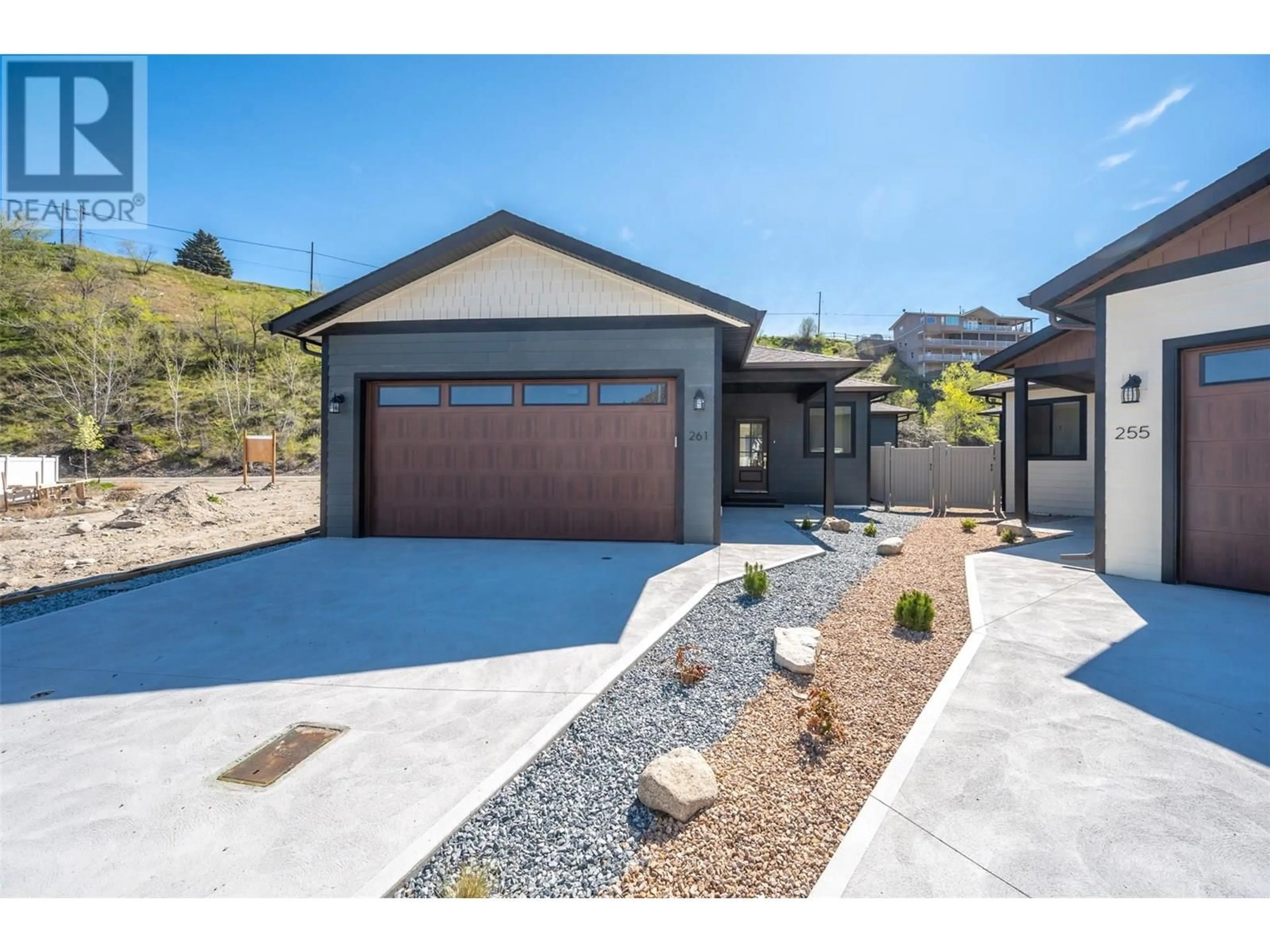 Home with brick exterior material, street for 261 BENTGRASS AVENUE, Oliver British Columbia V0H1T3