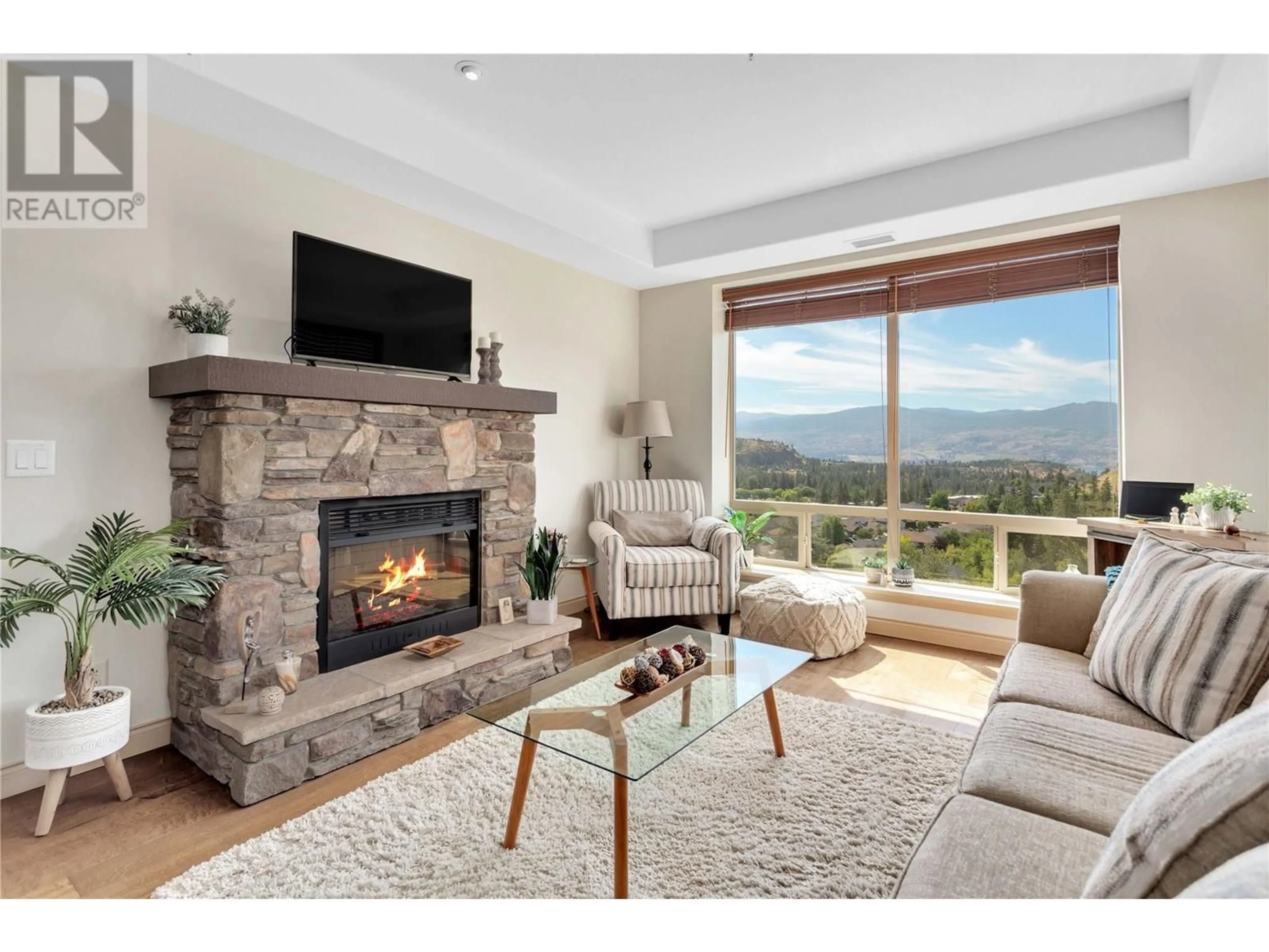 Living room with furniture, ceramic/tile floor for 304 - 2750 AUBURN ROAD, West Kelowna British Columbia V4T4C2