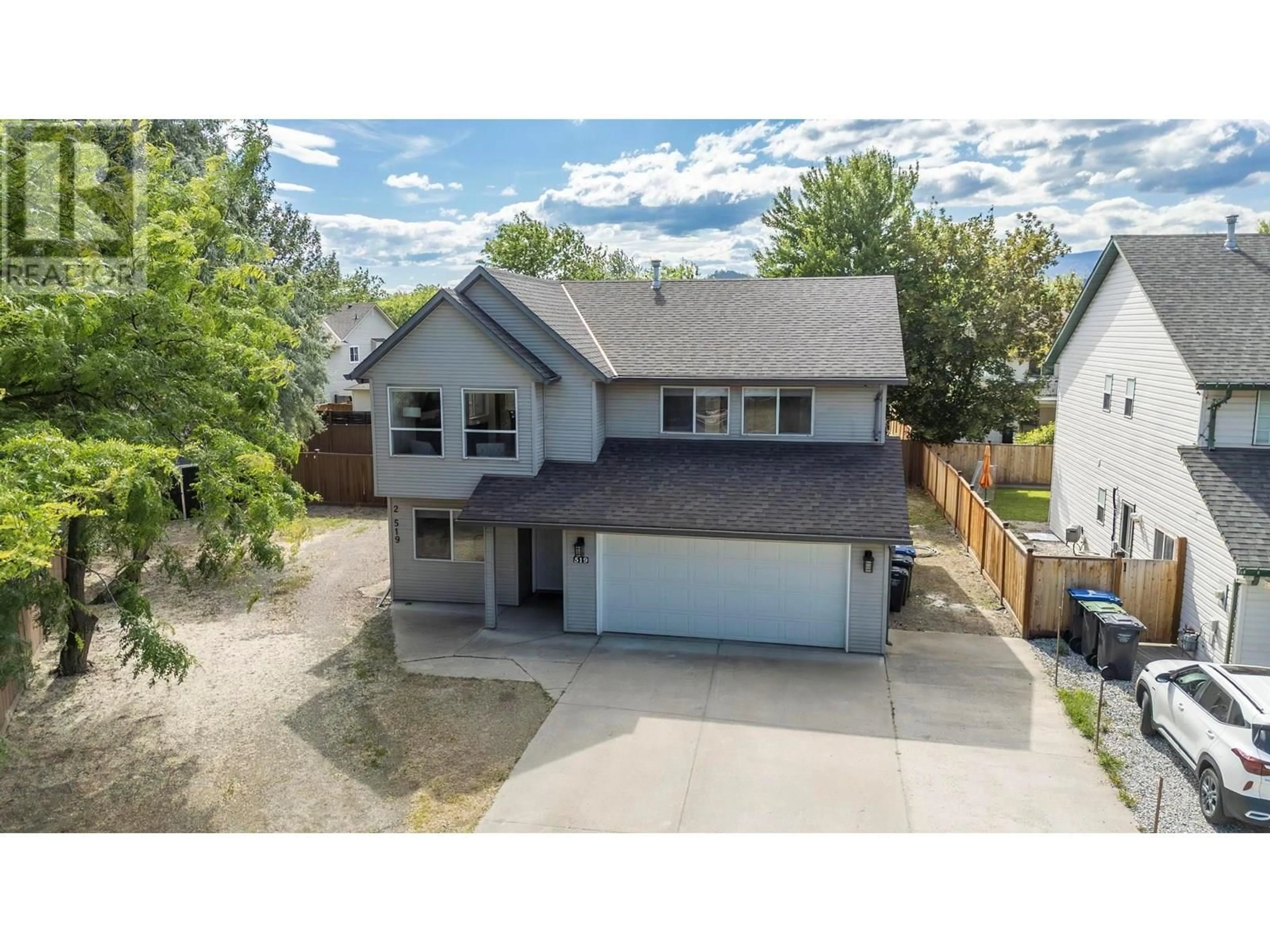 A pic from outside/outdoor area/front of a property/back of a property/a pic from drone, street for 519 CLAYTON CRESCENT, Kelowna British Columbia V1X1V1