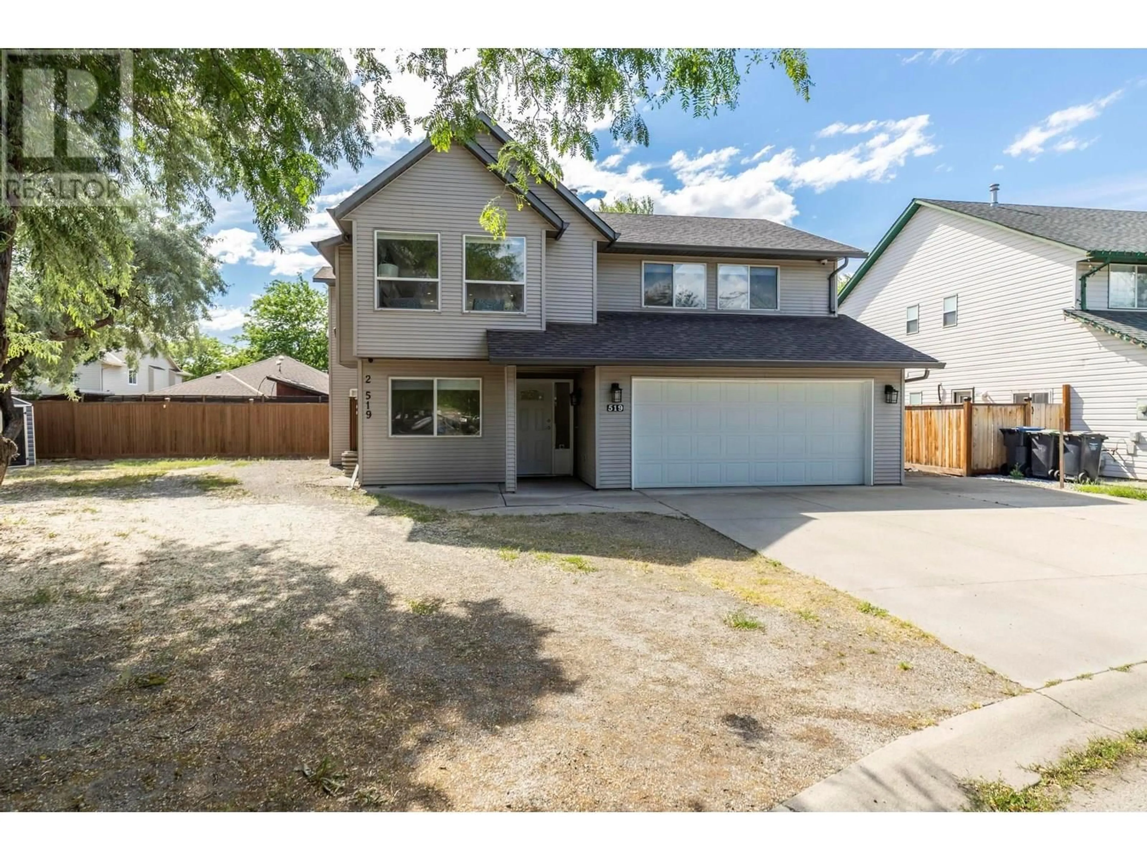 Home with vinyl exterior material, street for 519 CLAYTON CRESCENT, Kelowna British Columbia V1X1V1