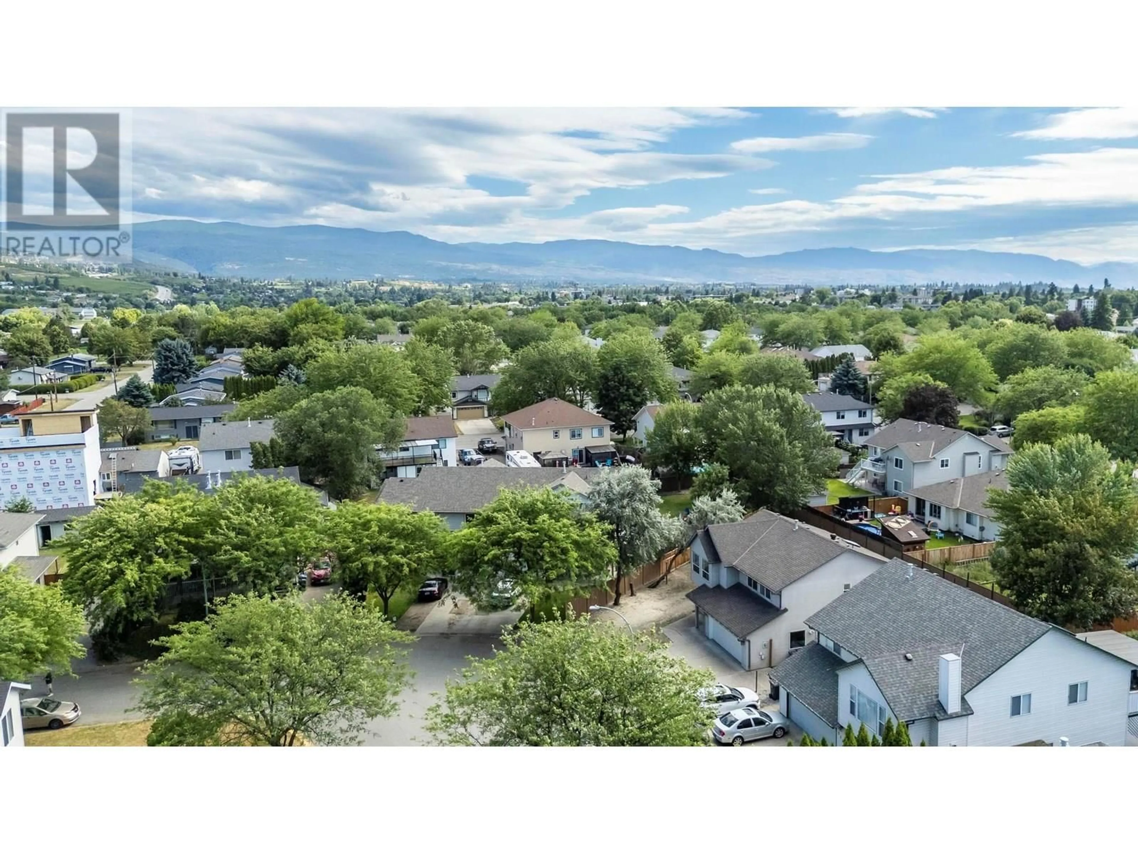 A pic from outside/outdoor area/front of a property/back of a property/a pic from drone, mountain view for 519 CLAYTON CRESCENT, Kelowna British Columbia V1X1V1