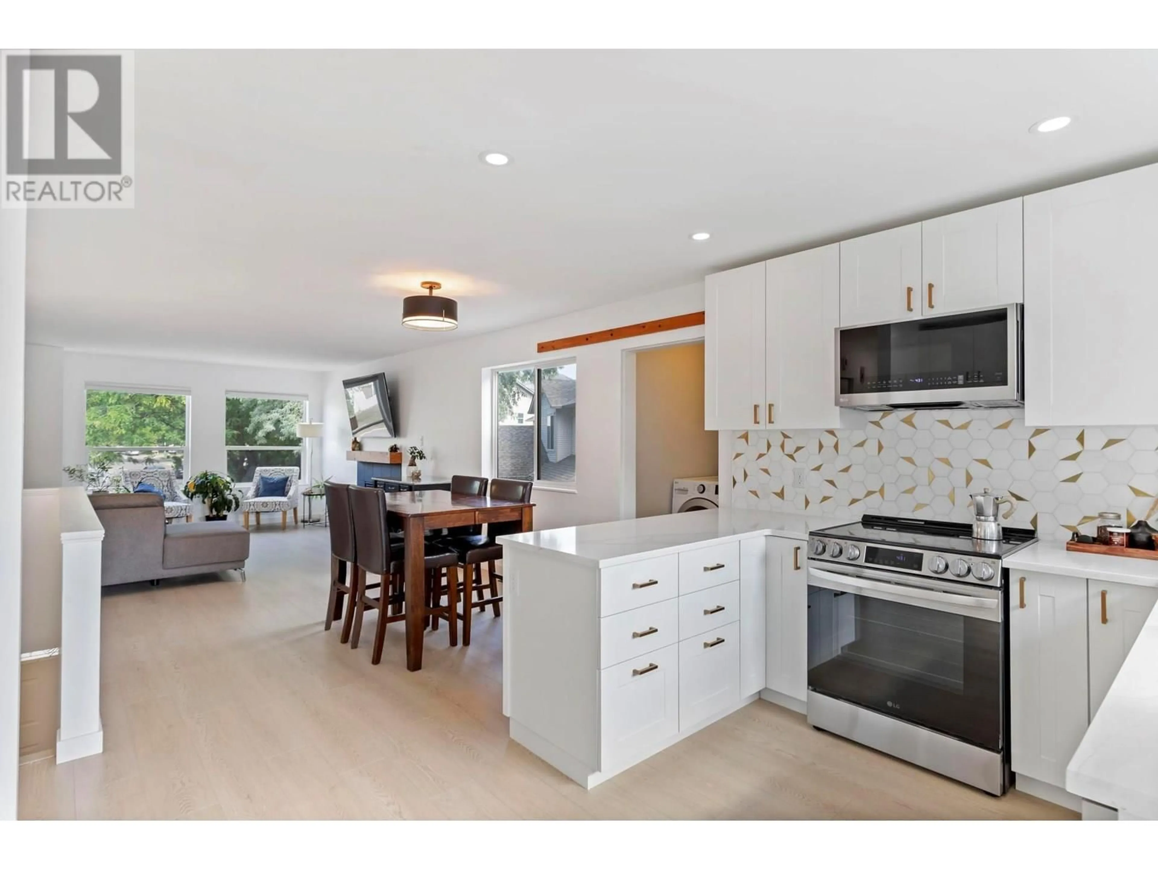 Open concept kitchen, ceramic/tile floor for 519 CLAYTON CRESCENT, Kelowna British Columbia V1X1V1